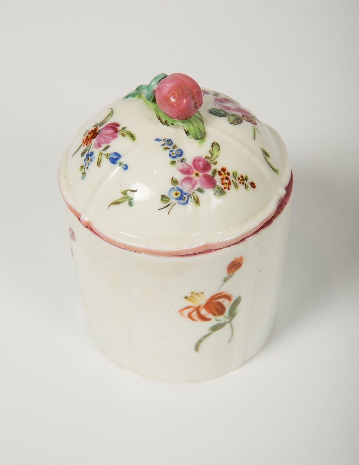  We are pleased to offer these beautiful Mennecy porcelain blush pots. The pots are decorated with hand-painted flowers in rich enamel colors, among them the distinctive Mennecy purple-rose hue seen on the cover of the pots. Made in the 18th century