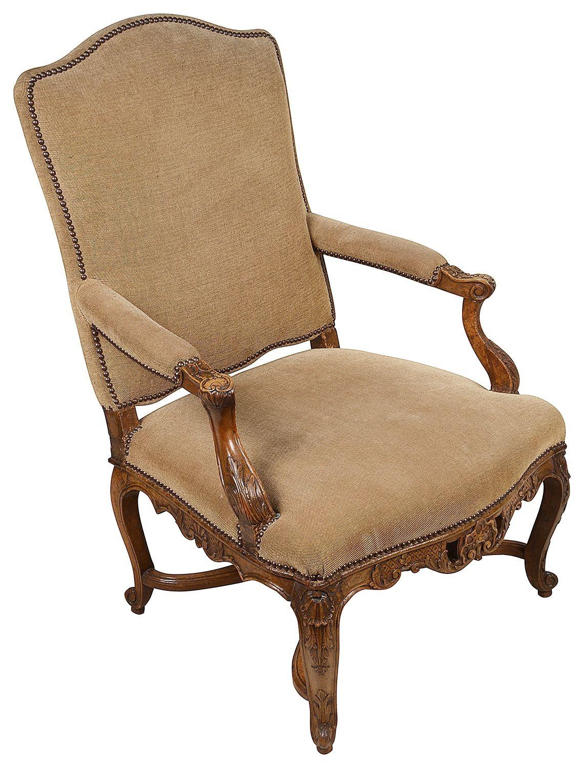 A very good quality pair of French 18th century carved walnut Bergere arm chairs, circa 1780.