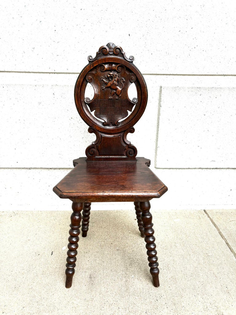 Pair 18th Century Italian Chestnut Hall Chairs Carved With Lion Crests Pair 18th Century Italian Chestnut Hall Chairs Carved With Lion Crests