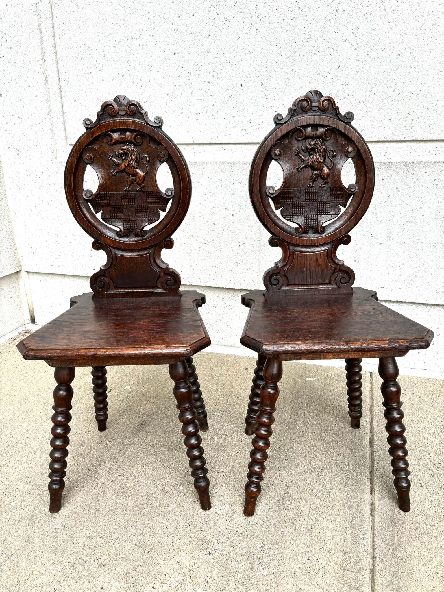 Pair 18th Century Italian Chestnut Hall Chairs Carved With Lion Crests  For Sale 1