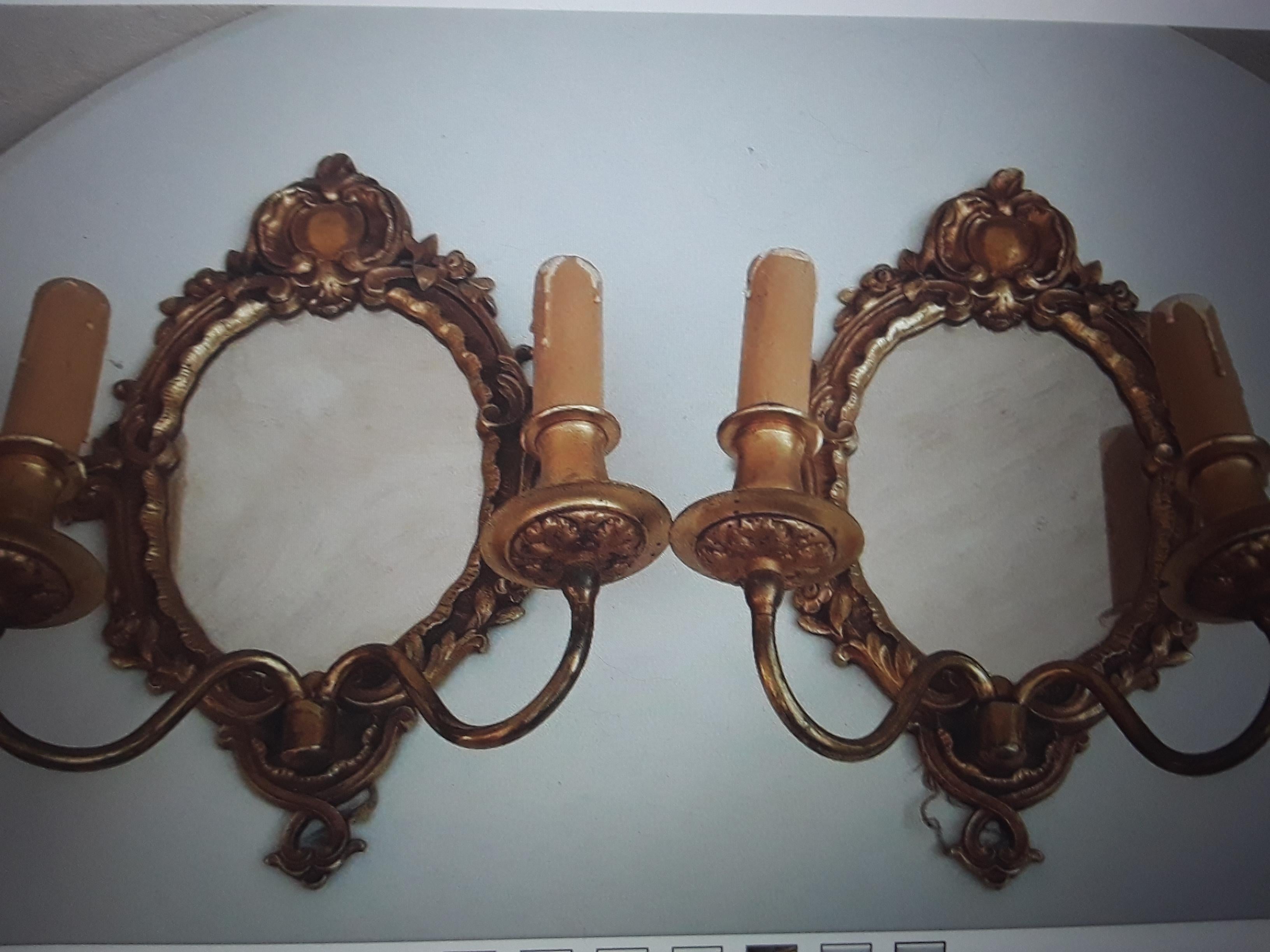 Pair 1920's French Louis XVI Rococo style Gilt Bronze Wall Sconces Signed by Atelier Petitot. These are very high quality sconces.