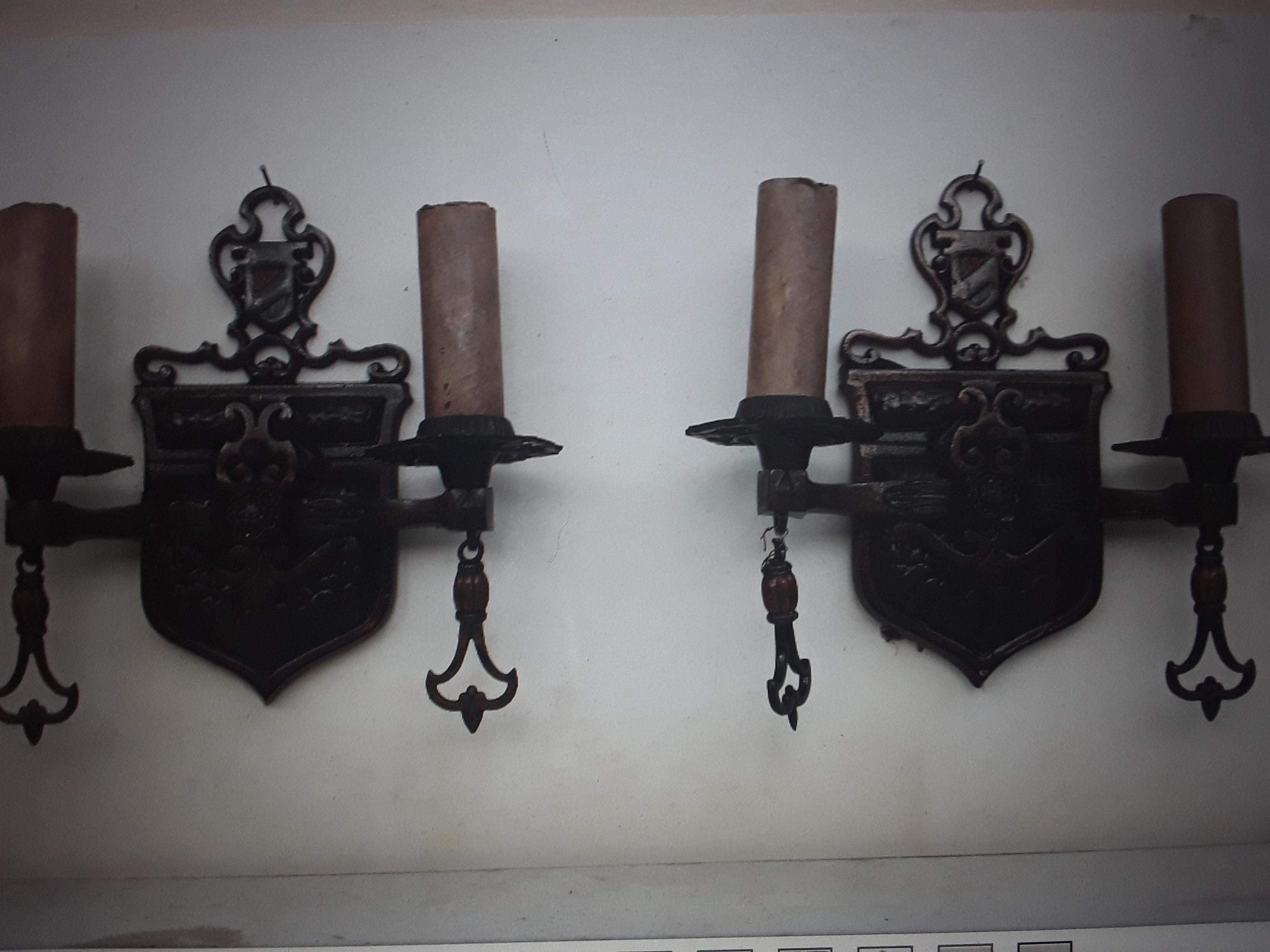 Pair 1920's French Renaissance Revival Shield Back Wall Sconces. Very nicely detailed.