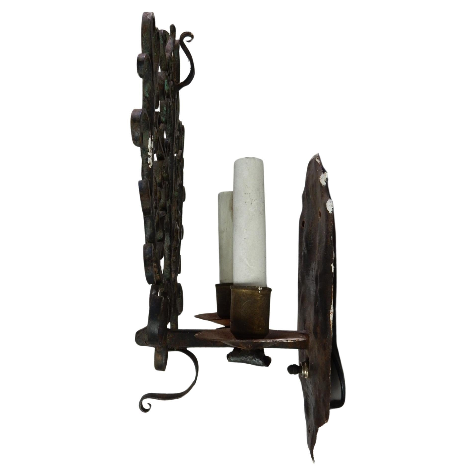 Pair 1920's Sculpted Wrought Iron Wall Sconces In Fair Condition In Las Vegas, NV