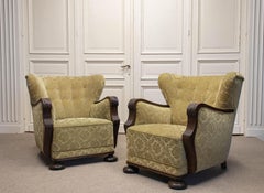 Pair 1920s Swedish Wingback Chairs With Golden Velvet And Carved Oak Armrests
