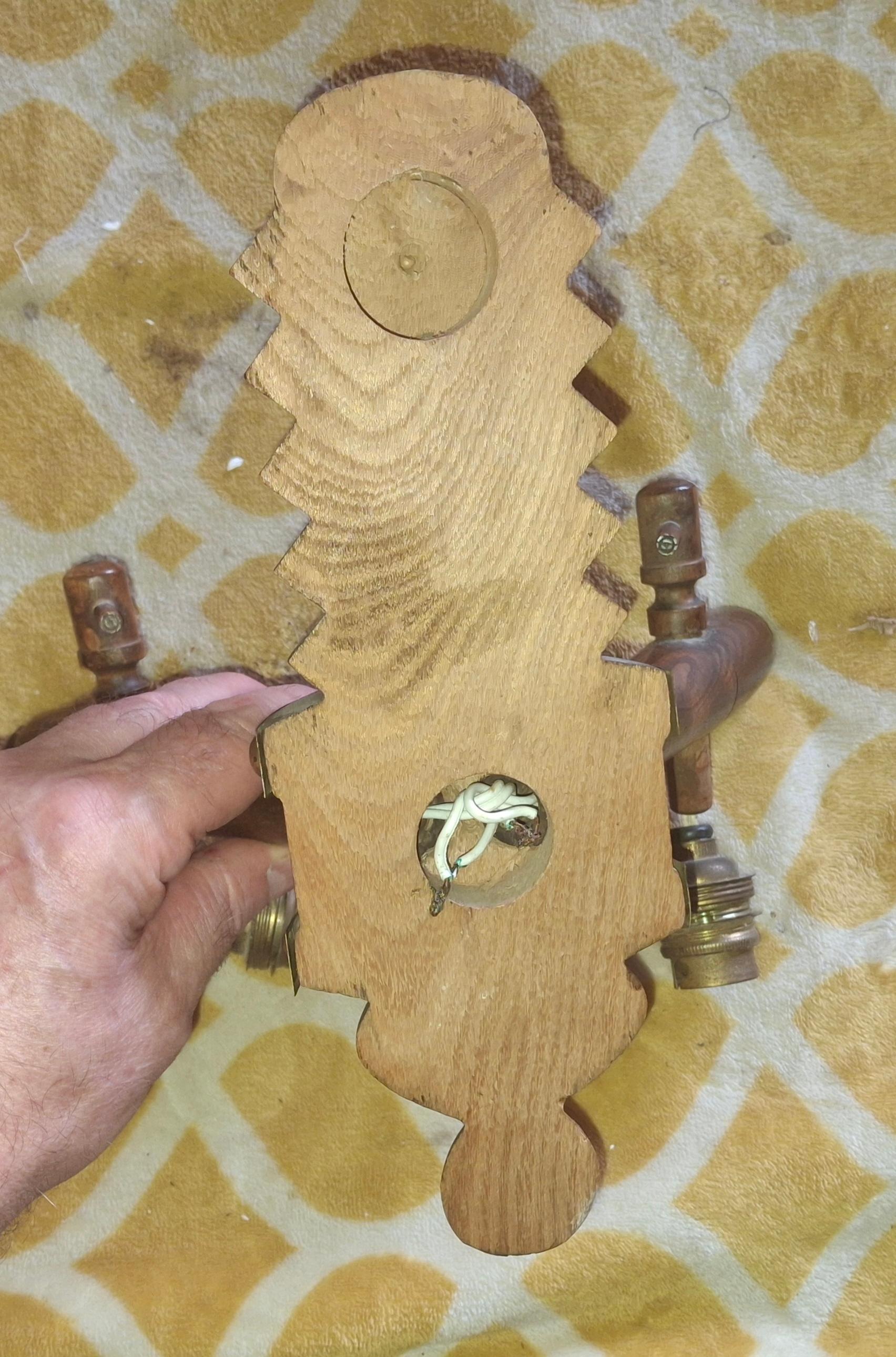 1930's Pair French Art Deco Carved Wood with Brass Accent Wall Sconces by Charles Dudouyt. Masterpiece investment pieces. Rara pair by Dudouyt. French Estate acquisition.