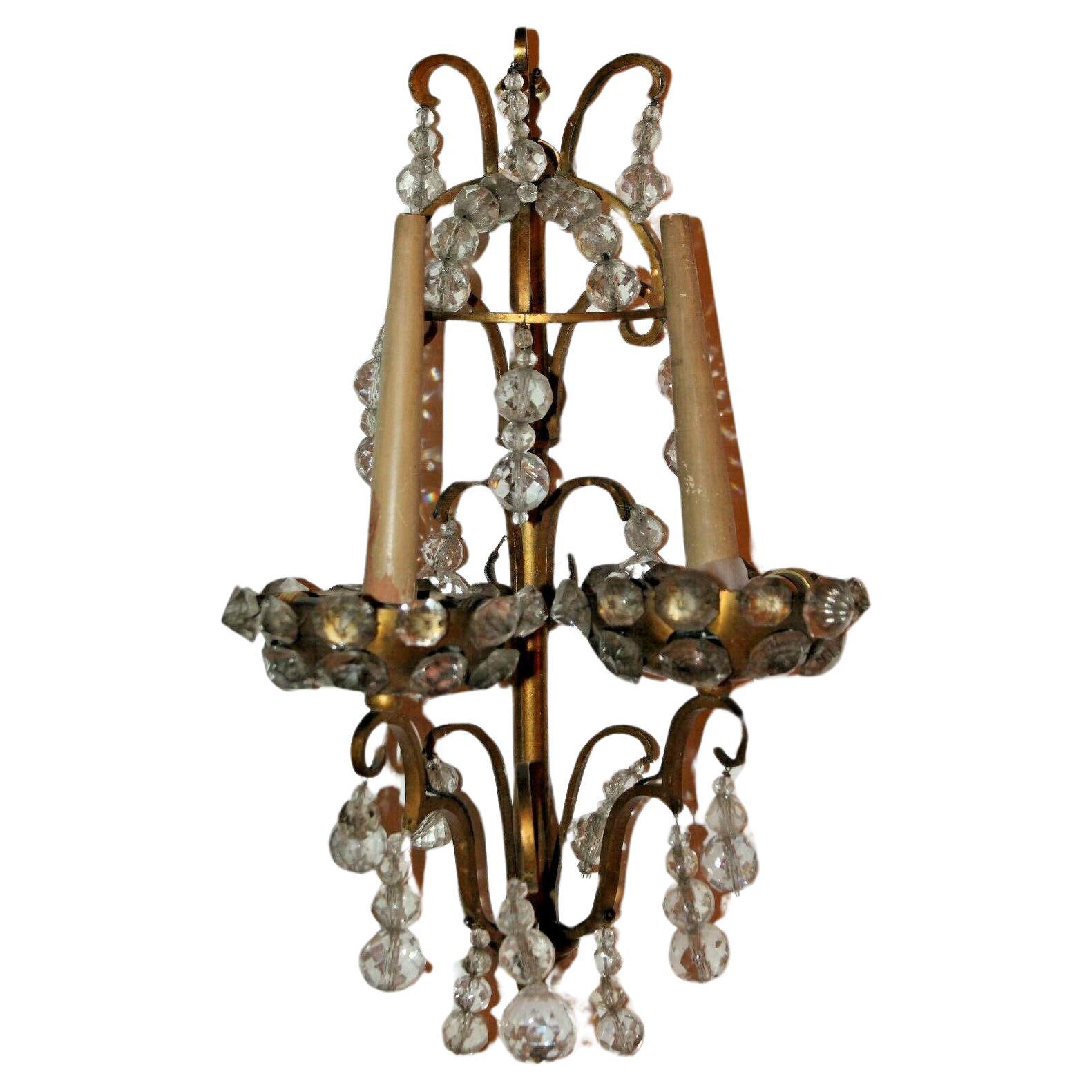 Pair 1930's French Louis XV Rococo style Gilt Bronze with Cut Crystal Wall Sconces attrib. Maison Jansen. These sconces are marked and are of the highest quality. 2 lights tucked in each bobesche. Faux candle tapers. Reminescent of the 