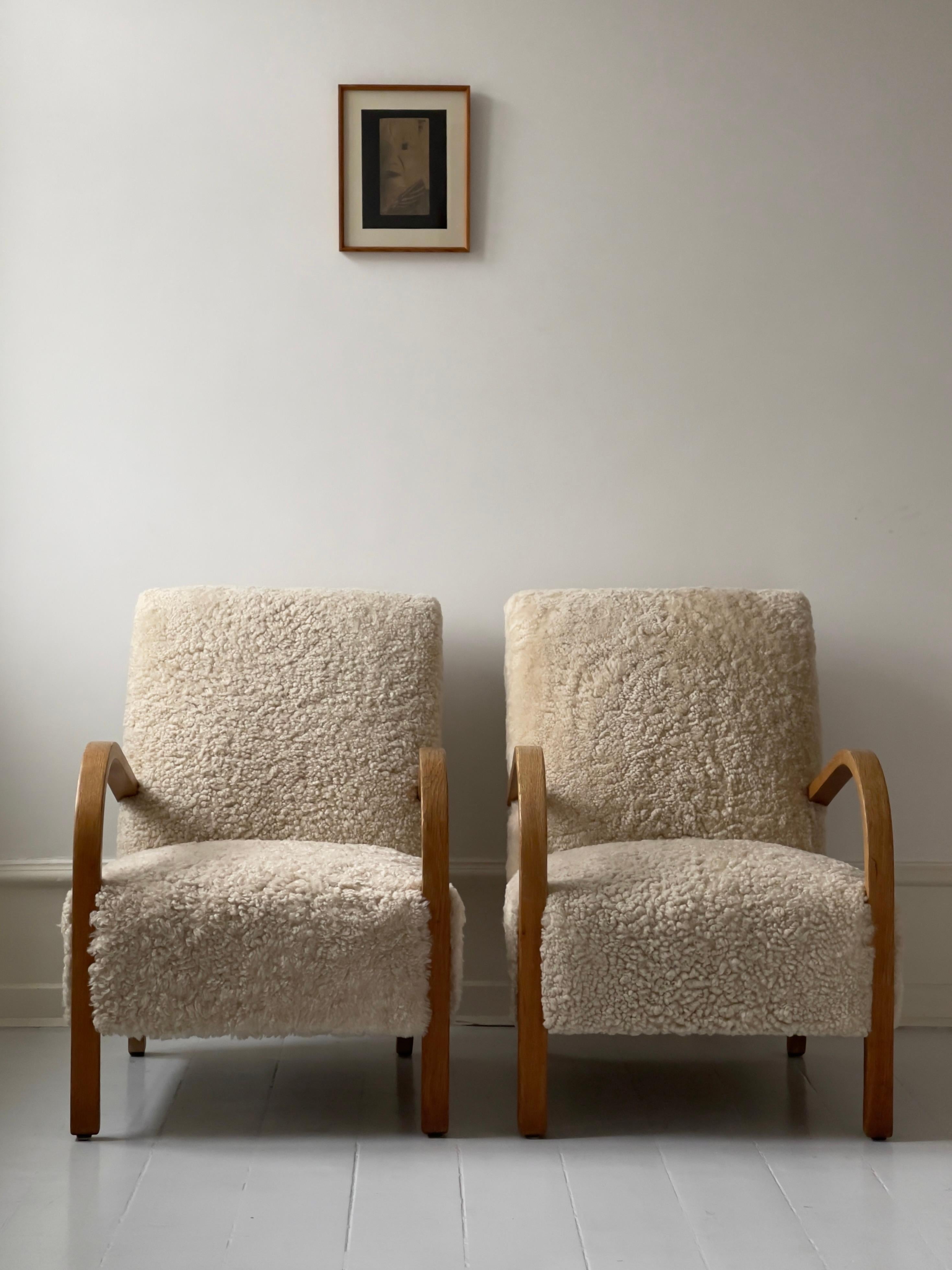 Pair 1930s Fritz Hansen danish modern Lounge Chairs in Sheepskin and Oak 8