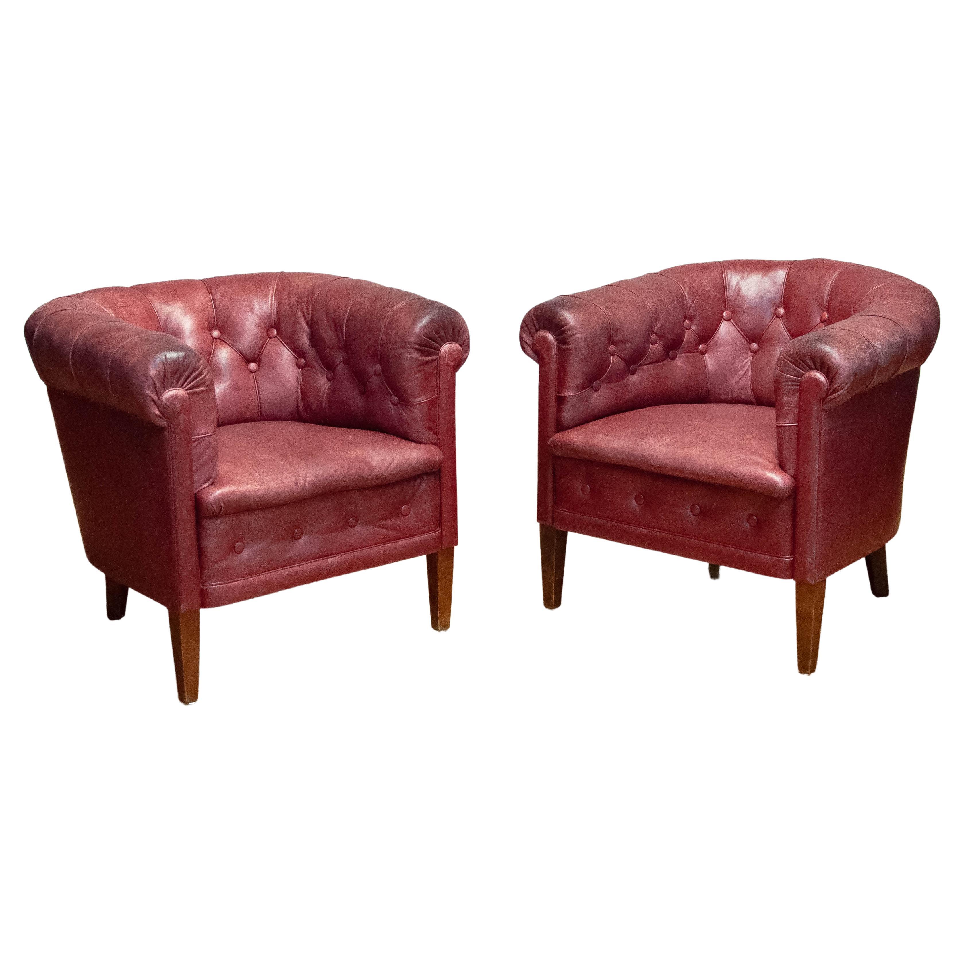 Pair 1930s Swedish Crimson Red Chesterfield Club Chairs in Patinated Leather