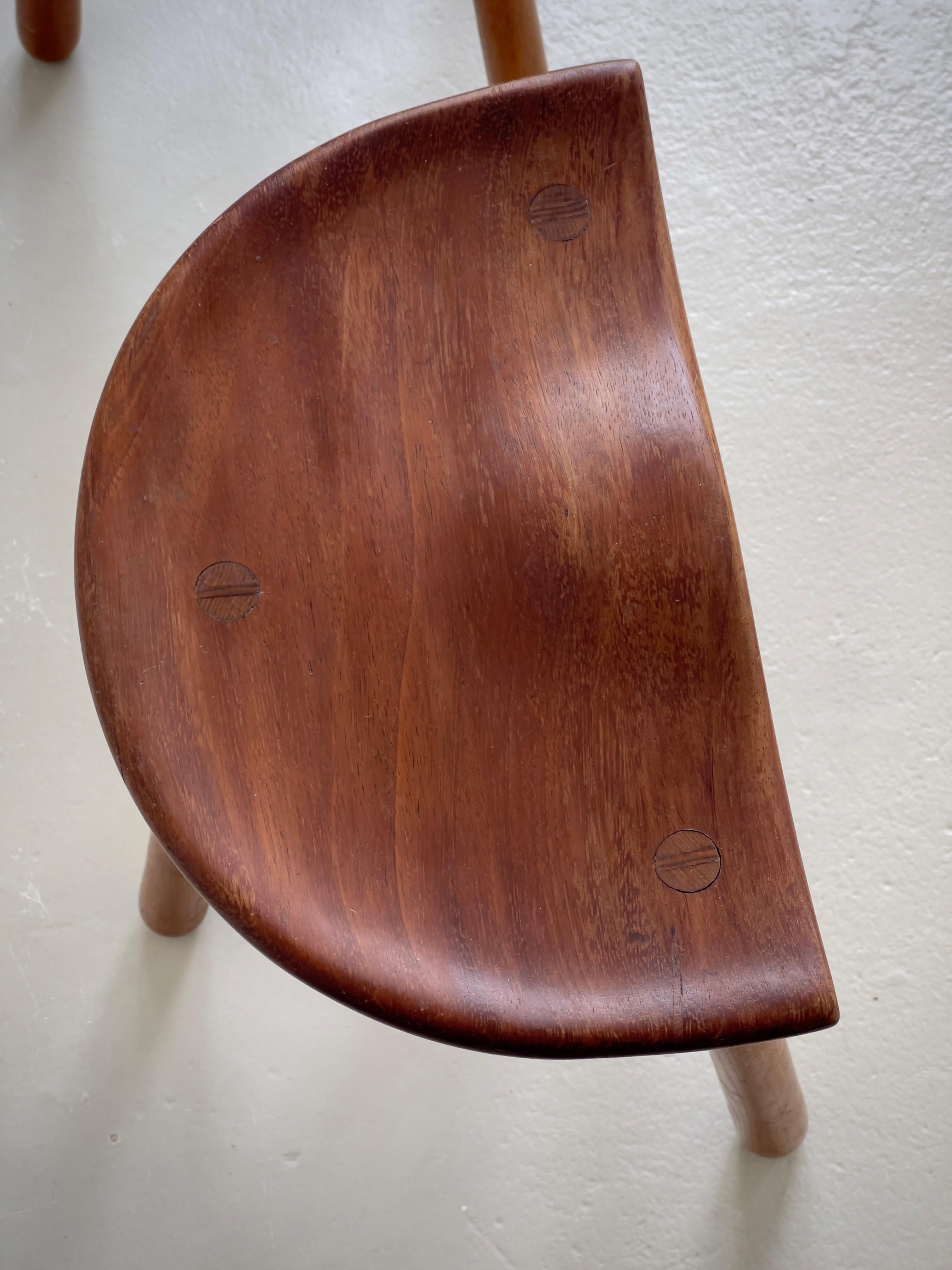 Pair 1940s danish cabinetmaker stools carved teak seats and club shaped oak legs In Good Condition For Sale In København K, 84