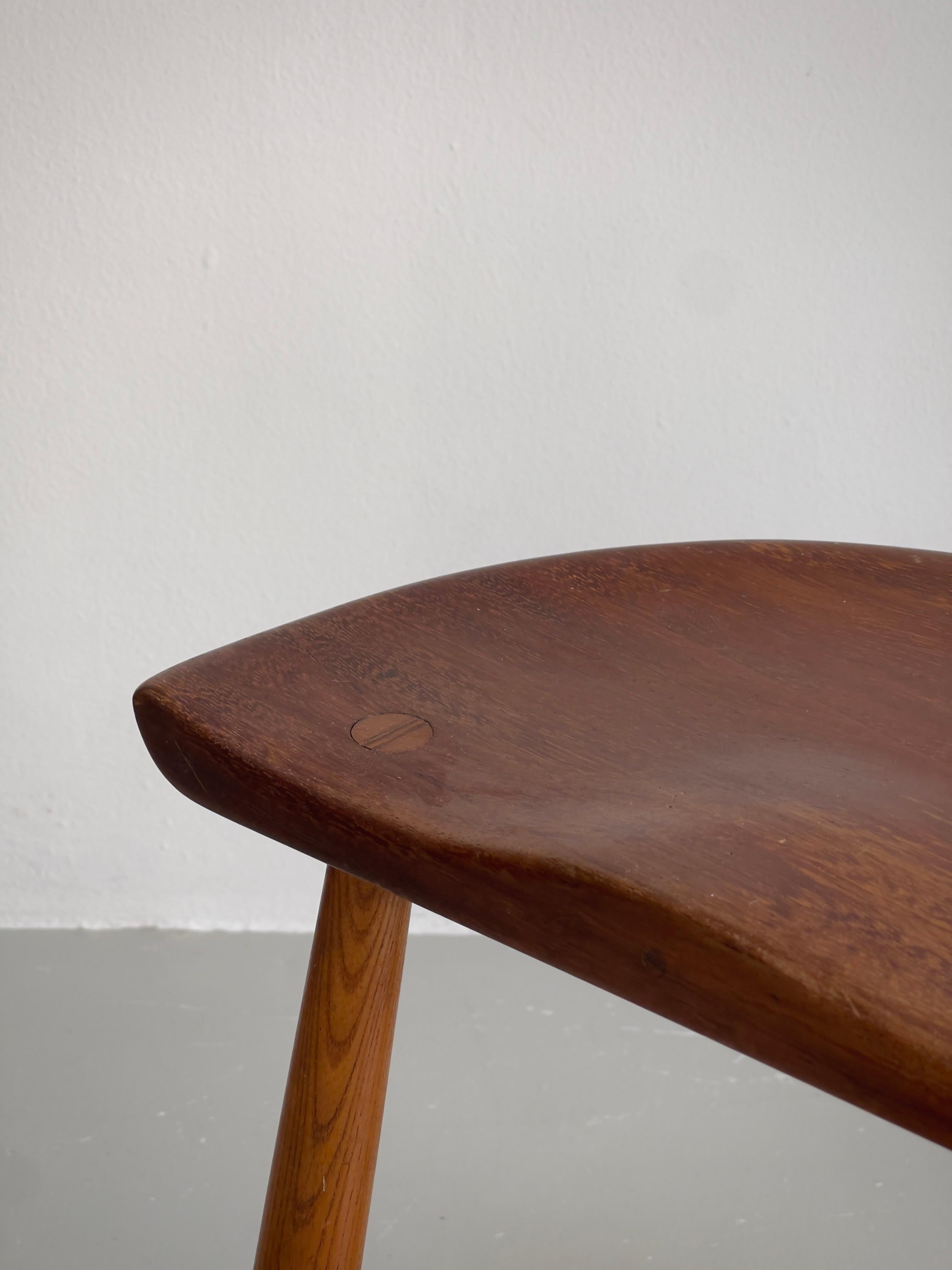 Pair 1940s danish cabinetmaker stools carved teak seats and club shaped oak legs For Sale 1