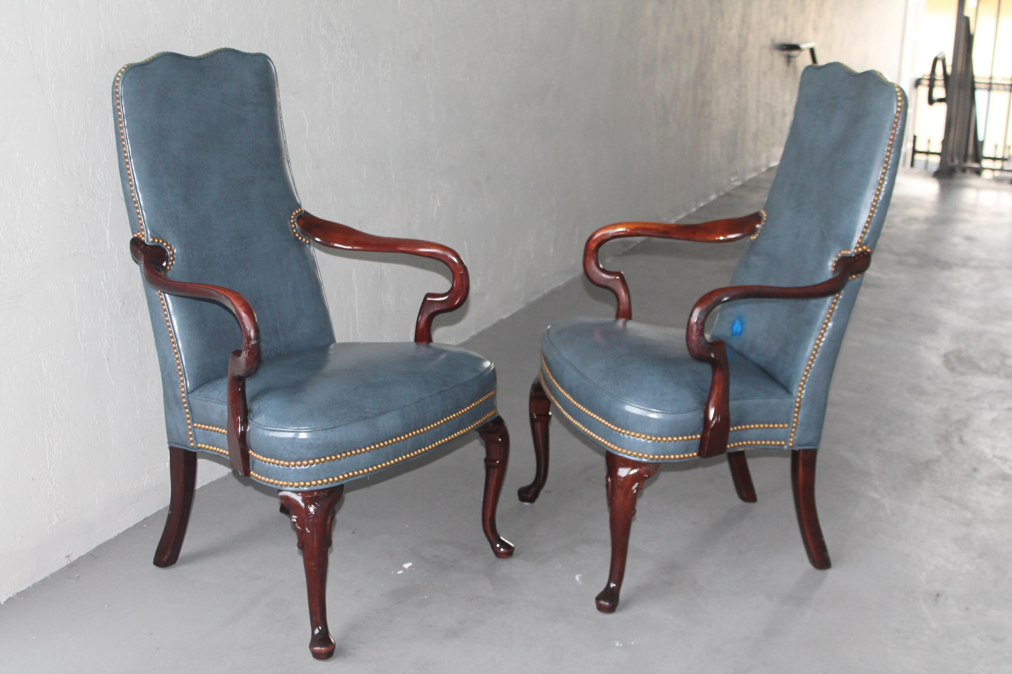 Pair Mid Century Modern Carved Wood and Blue Leather Parsons Chairs. Very unique and ultra high quality. The wood carving is exceptional and the blue leather is gorgeous! Miami Beach estate find.