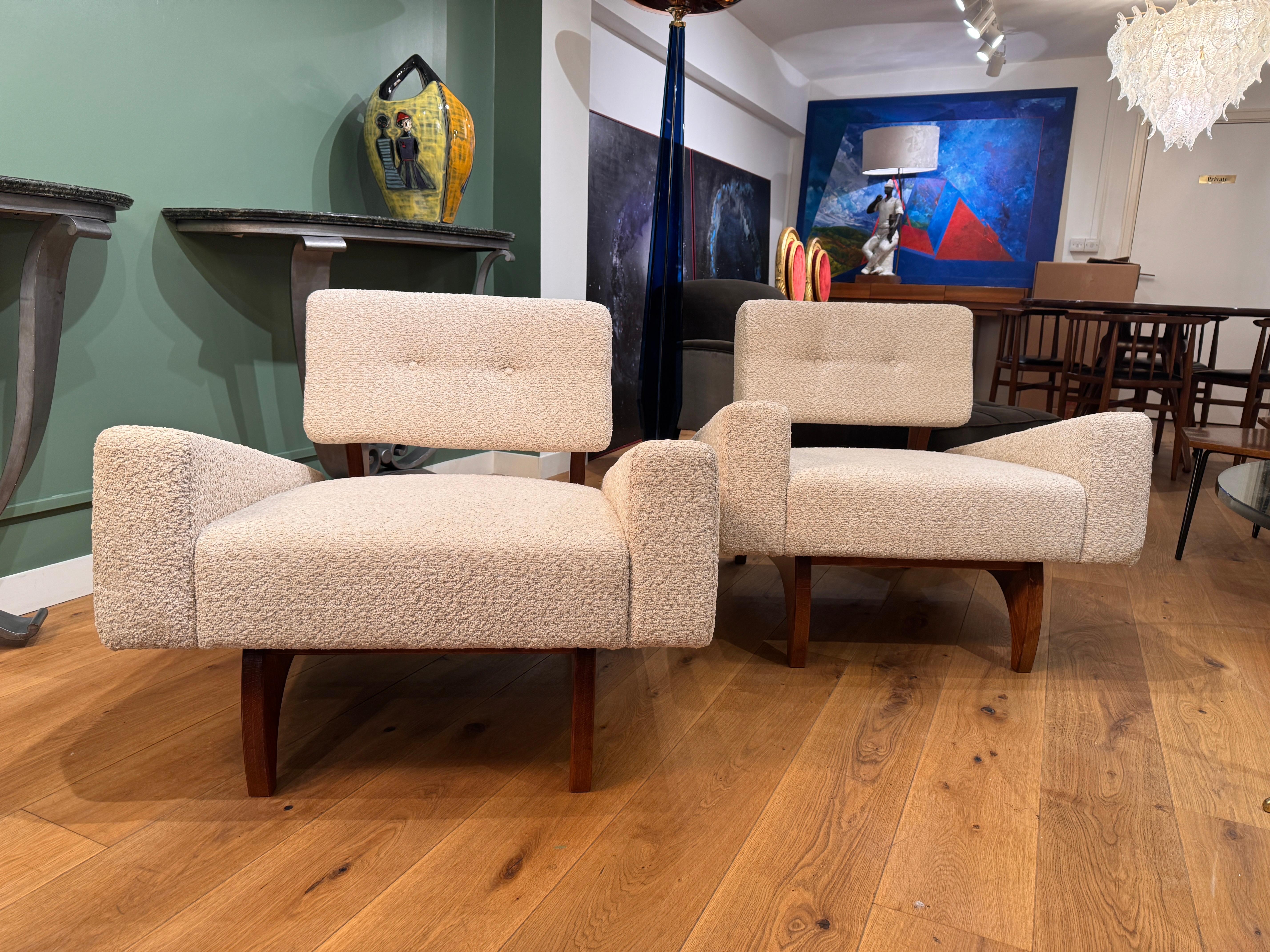 Model Madrid- pair of 1960s architectural armchairs in polished walnut newly upholstered in soft lambswool boucle fabric . 
Italy 
C1960-1969 
