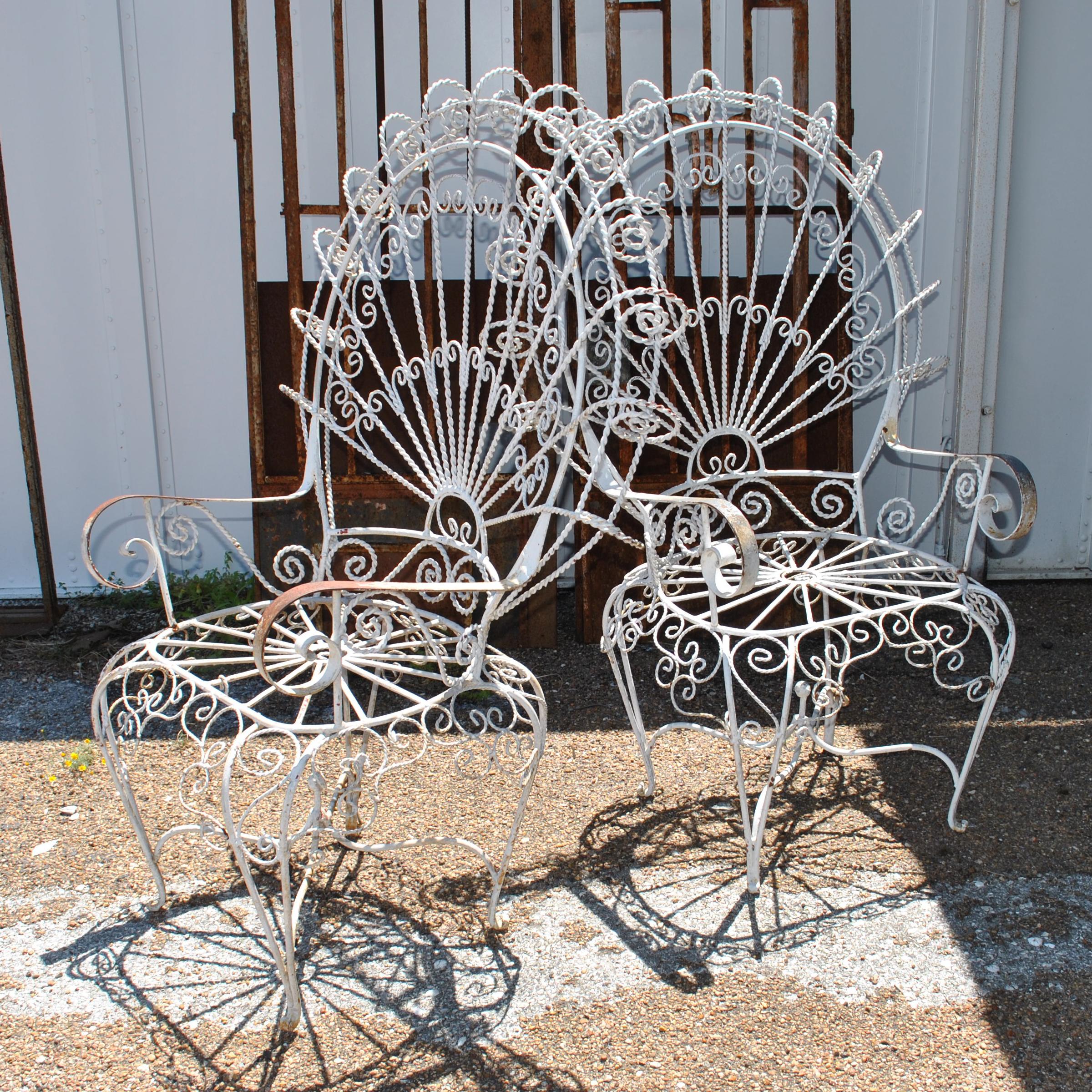 John Salterini

Pair 1960s John Salterini vintage midcentury wrought iron wire peacock chairs 


Victorian style chairs designed with a back pattern reminiscent of a peacock age appropriate patina.