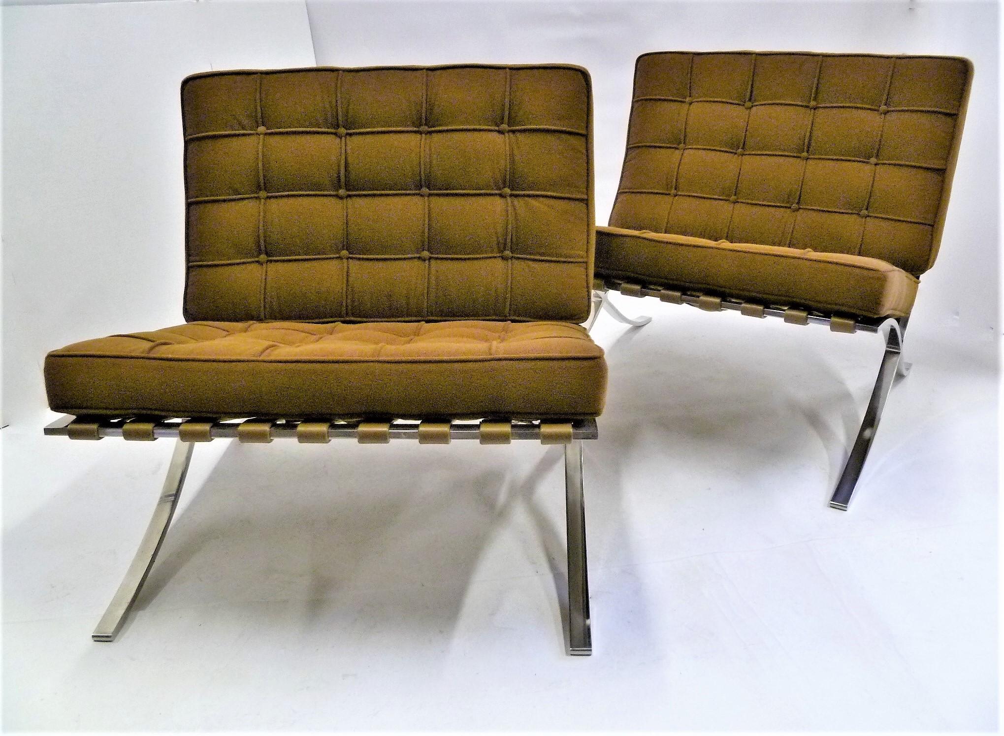 Pair of fine 1960s Knoll Barcelona chairs designed by Mies van der Rohe. This pair produced in the 1960s. Reupholstered in a Knoll Spencer in Caramel micro-loop cocoa brown fabric with original leather straps underneath. Original Knoll tag attached,