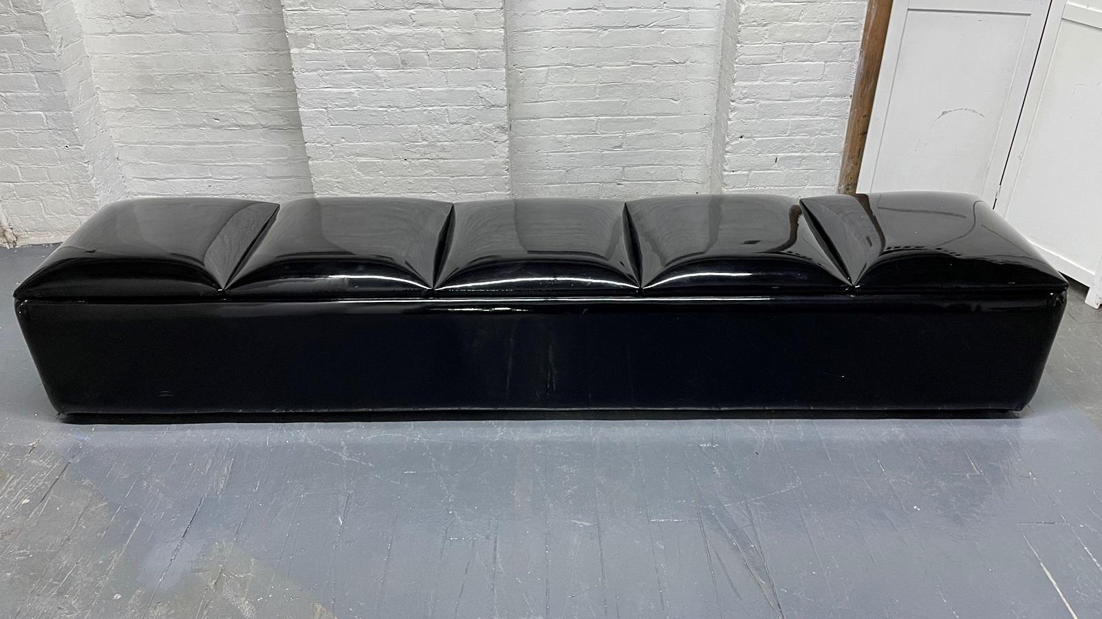 Pair of 1960s long black vinyl benches. Nice shiny vinyl, well made and comfortable.