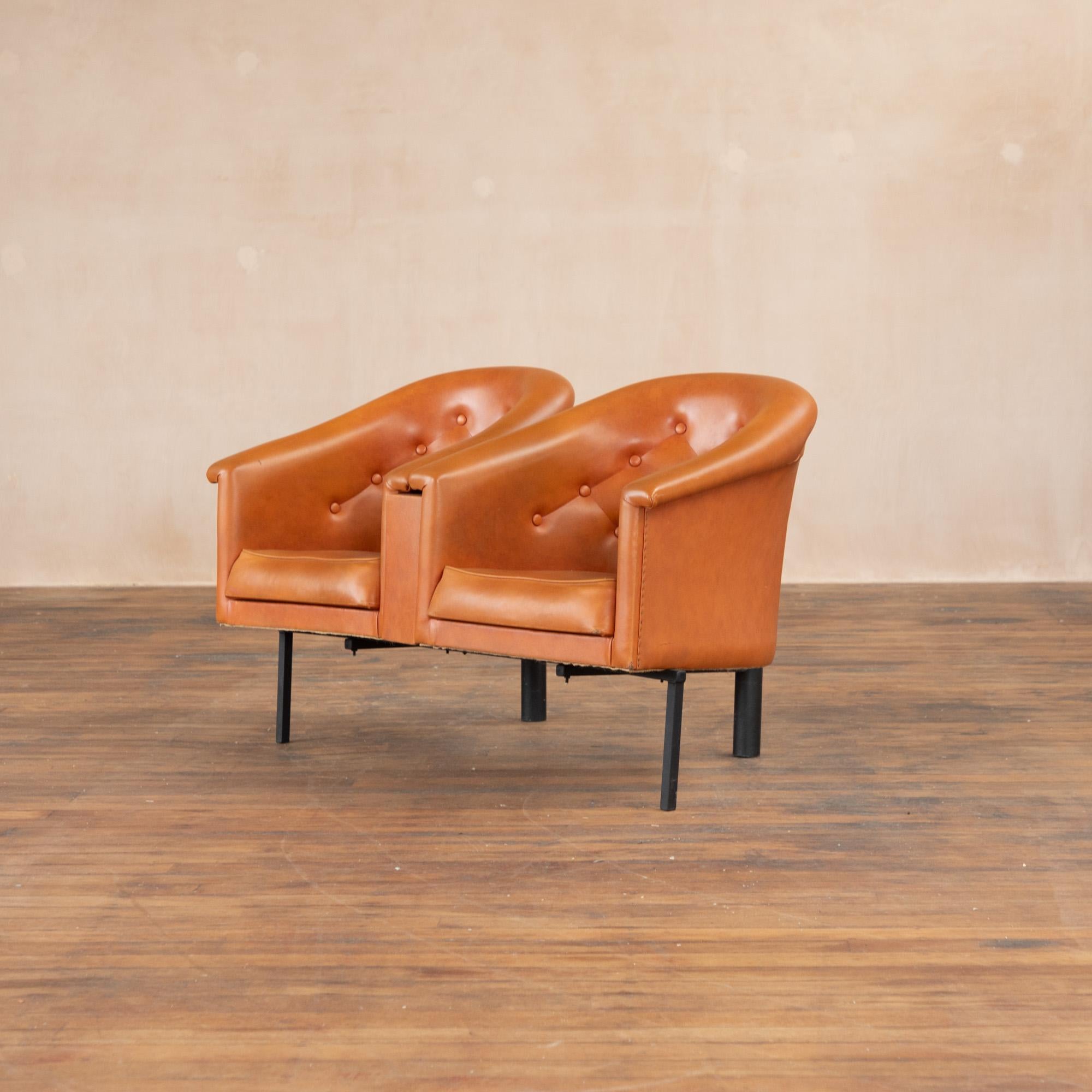 The cutest set of  1960s tub chairs taken from a hairdressers in the UK. Orange vinyl with buttoned back detail. Ideal for hallway or waiting room.
Vinyl is vibrant and is generally in good condition apart from on one arm where there is a small slit