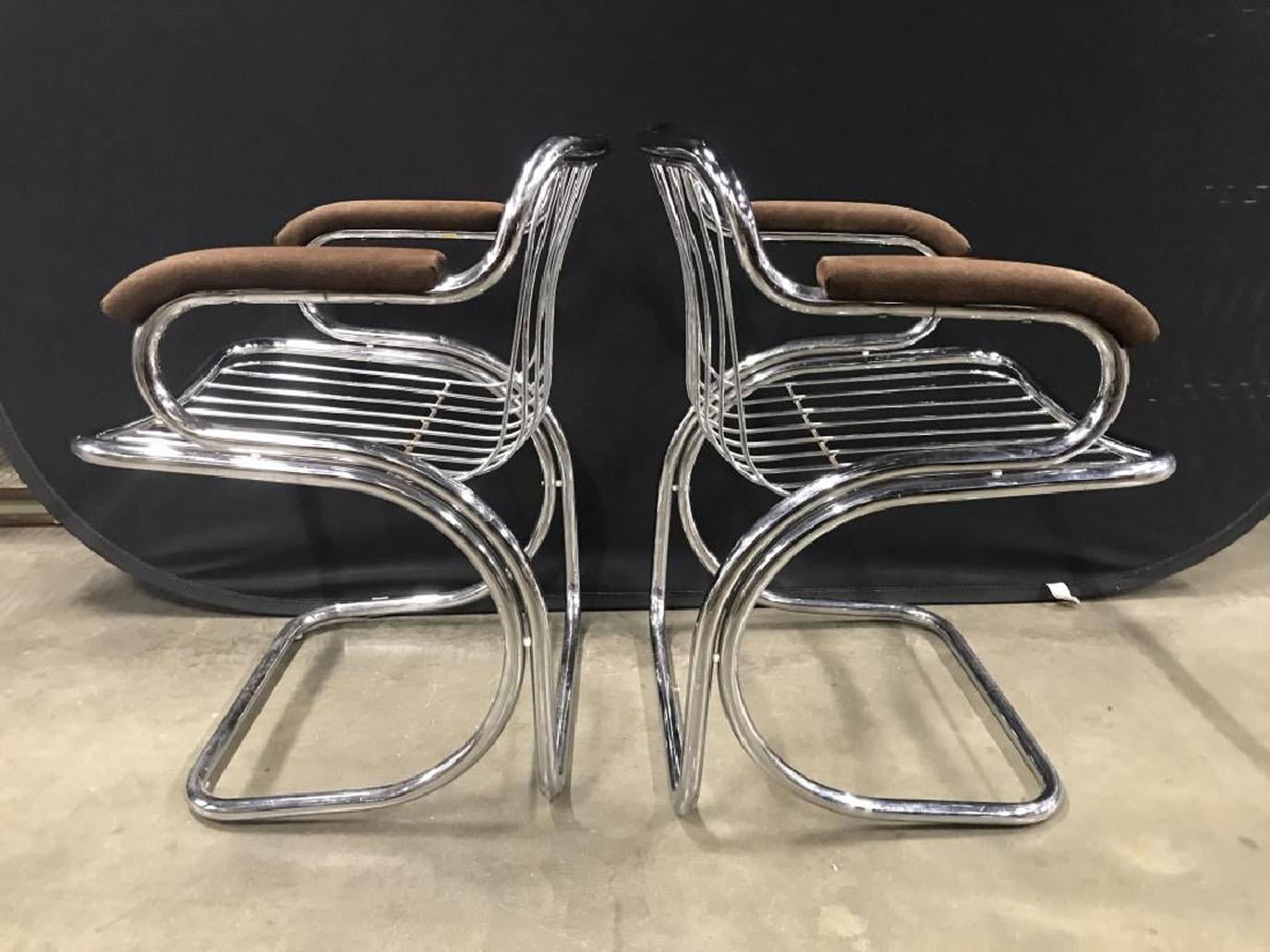 1970s Italian Gastone Rinaldi Cantilever tubular chrome armchairs with upholstered arm pads, some slight pitting to chrome. Search terms: Jerry Johnson style chairs, vintage 1970s chrome chairs, Tubular chrome armchairs, vintage chrome armchairs,