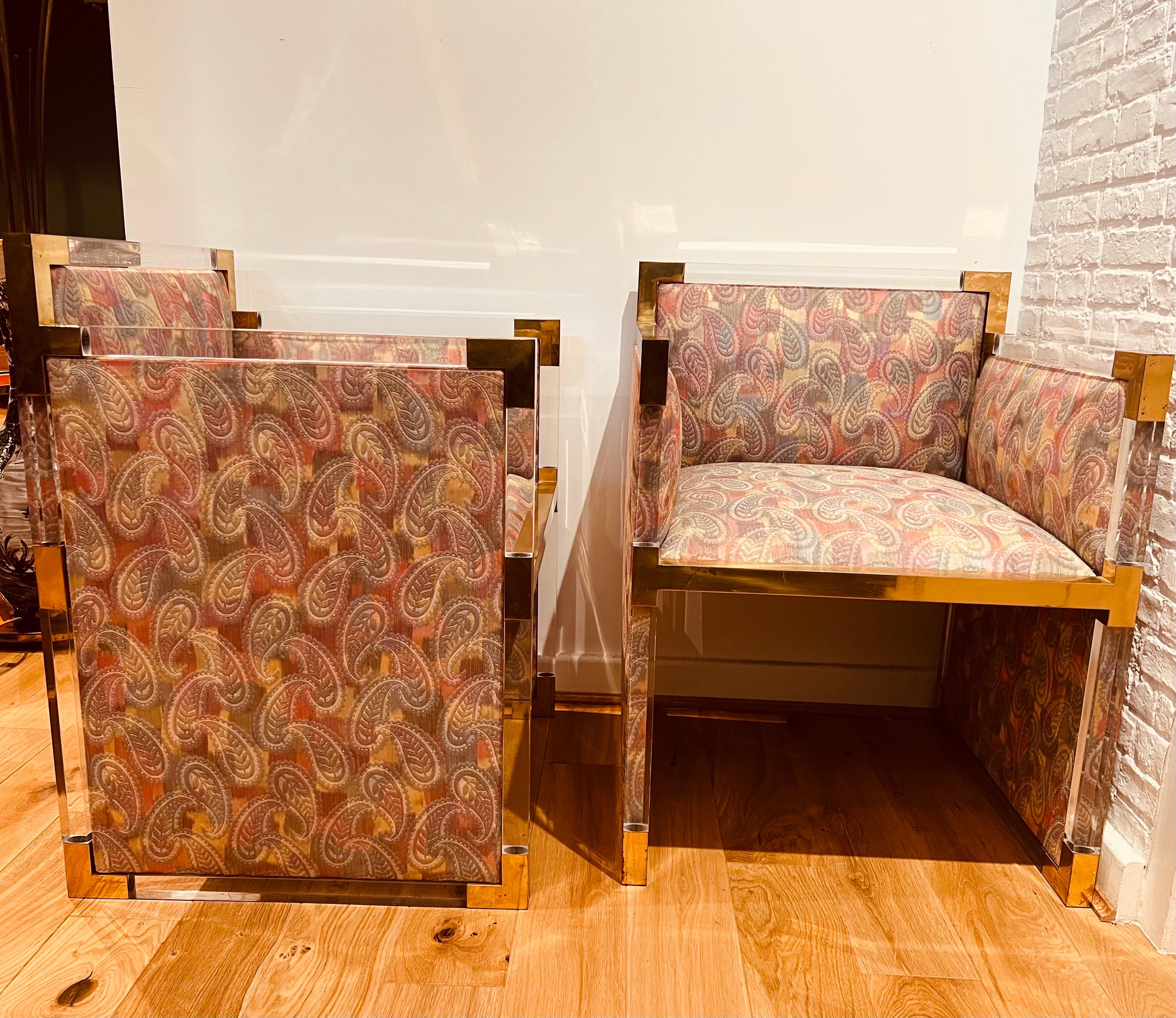 A stylish pair of lucite and brass cubicle chairs with original paisley embroidery fabric. A super example of Italian design and craftsmanship from the 1970s.

Dimensions: H:74cm W:56cm D:53cm Seat height:41cm
 