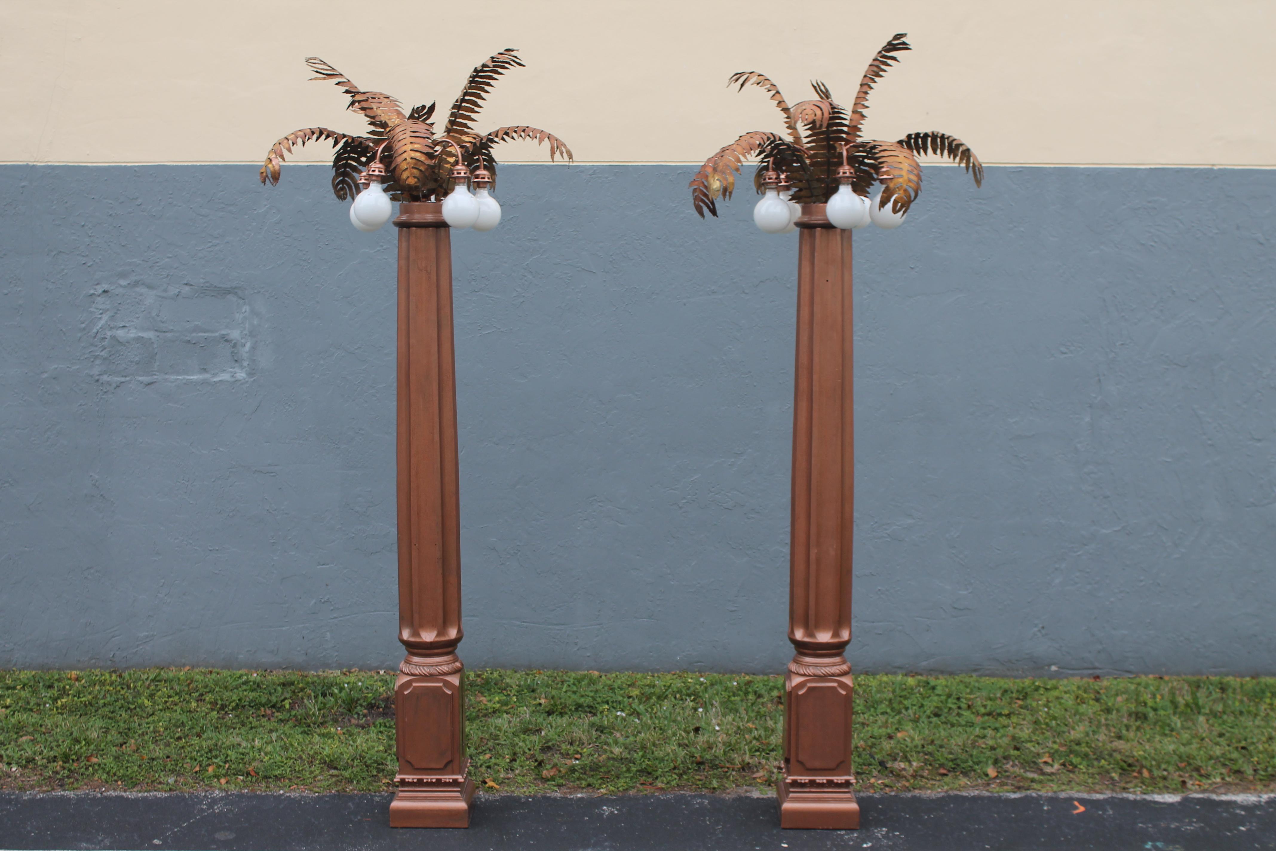Amazing Pair French 1970's Mid Century Modern / Brutalist Life Size [106 inches high] Palm Tree Torchere/ Floor Lamps. Brutalist palm fronds protruding from the top of these custom pedestals. Origins - The Club Castell in Paris. Copper toned carved