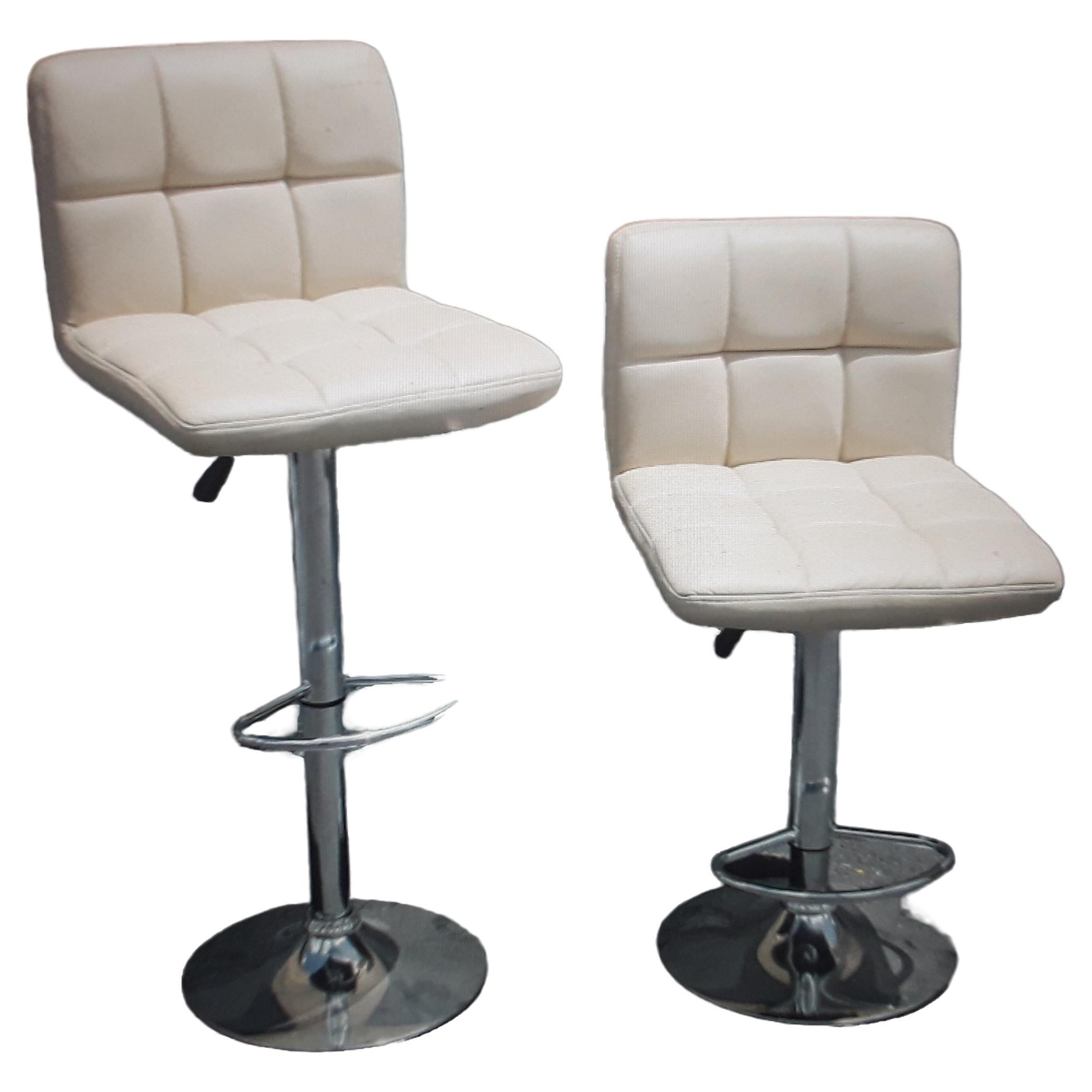 Pair Mid Century Modern Faux White Leather Bar Stools. Adjustable height.