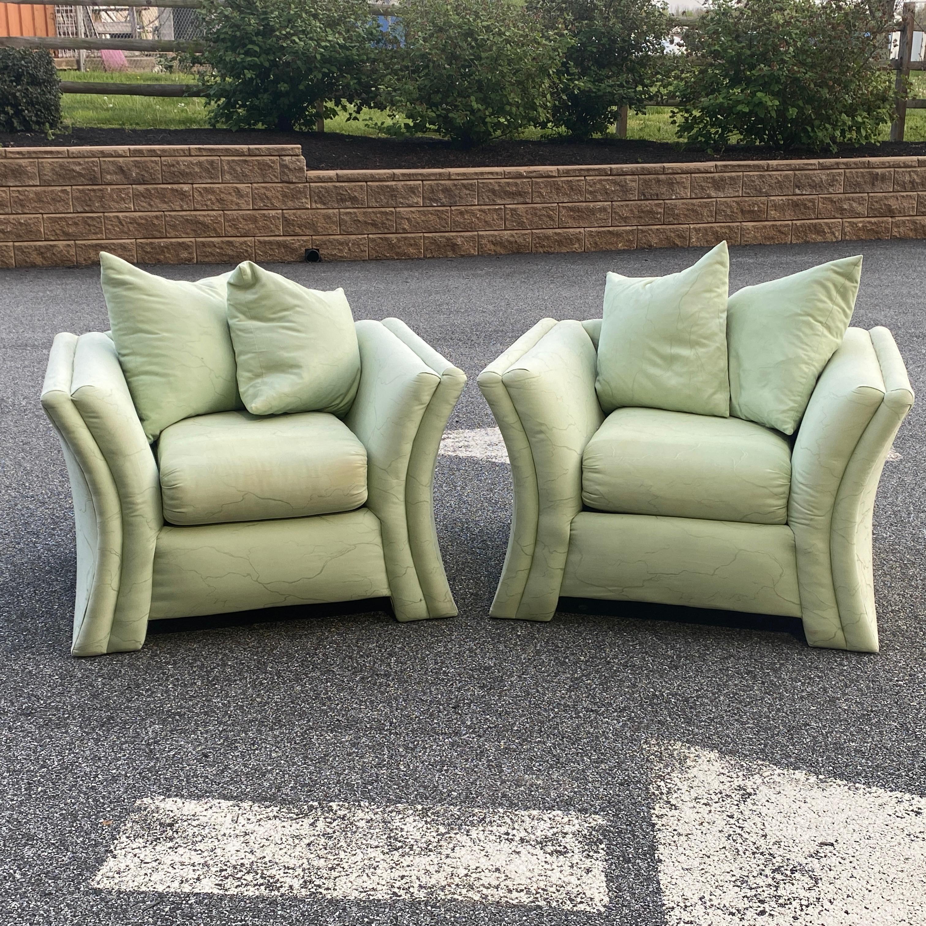Pair of designer lounge chairs manufactured by Royal Lounge Co. of West Haven, Connecticut featuring curved sides and down pillow backs circa 1985. In need of reupholstering. 
