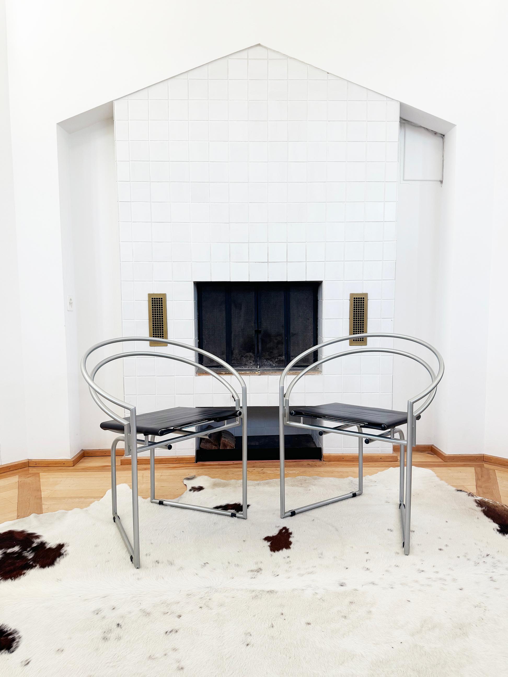 What Beauties! Stunning RARE PAIR of Mario Botta accent chairs for any space!
Very fast shipping, insured 7-21 days.

RARE Black leather model, with silver frame.
Chair 