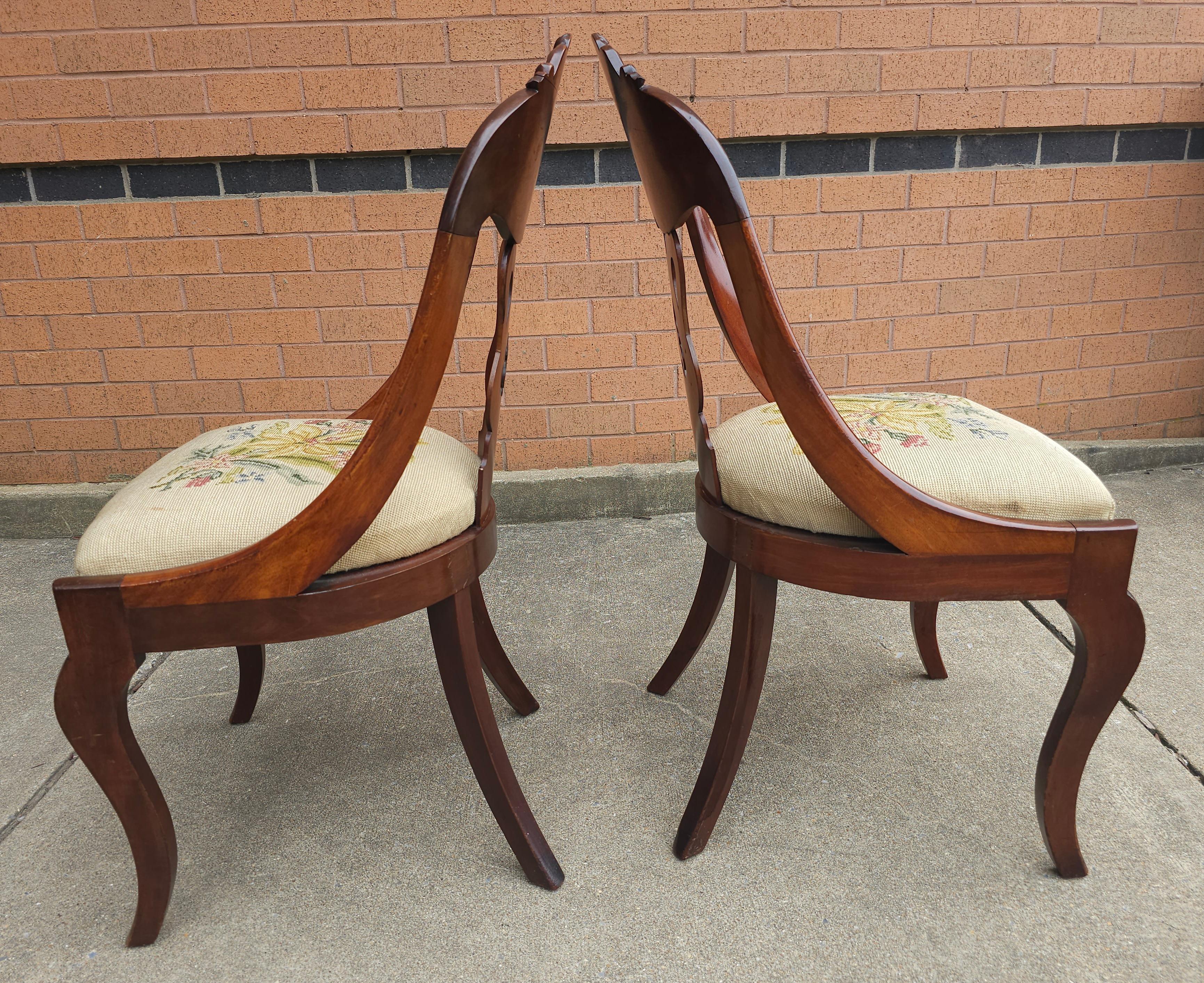 Pair 19th Century American Empire Carved Magogany and Upholstered Chairs. Measure 18.25