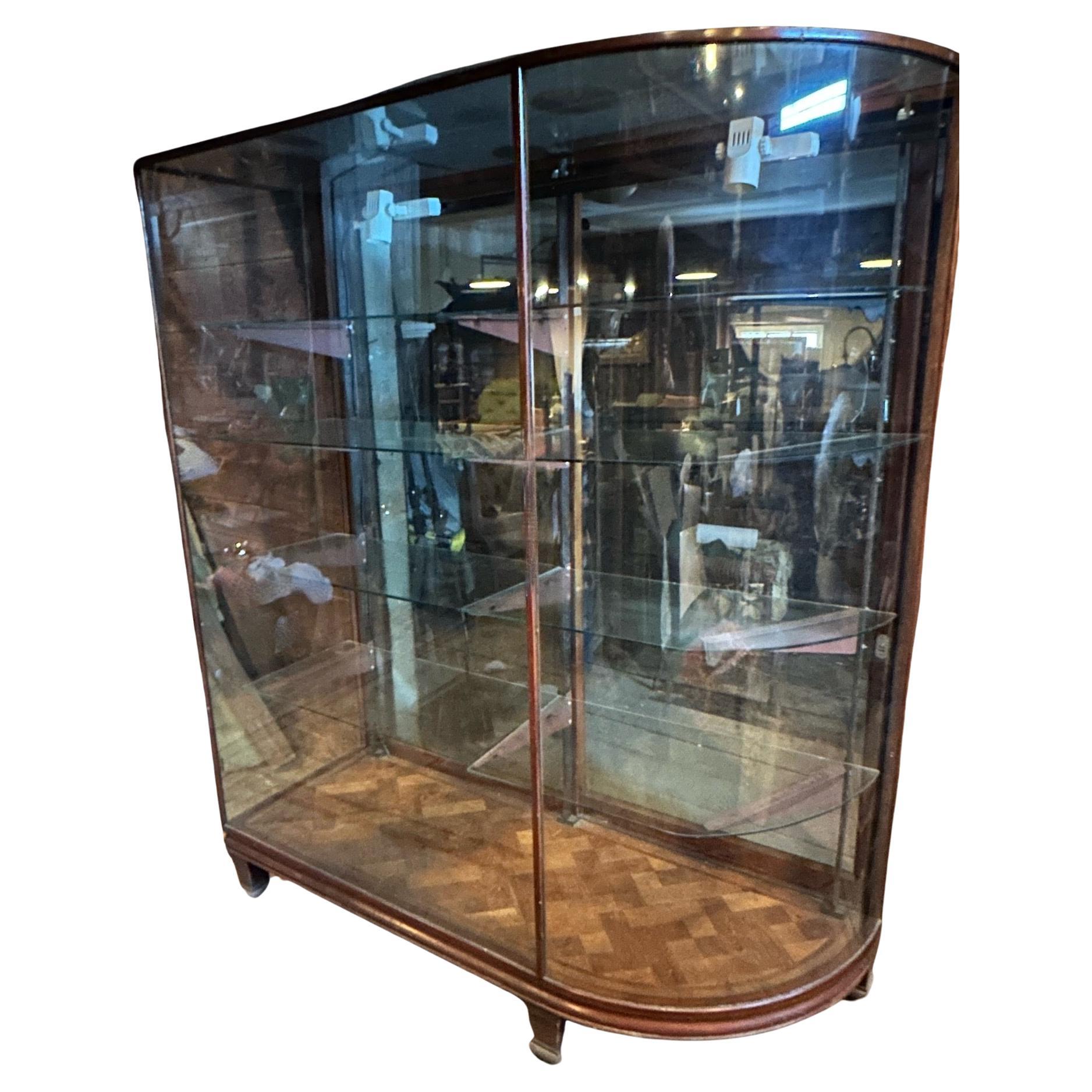 Early 20th Century Pair 19th C Bow Glass Sided Display Cabinets from an Upscale Boston Fashion Shop For Sale