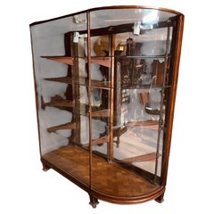 Pair C.1900 Bow Glass Sided Display Cabinets from an Upscale Boston Fashion Shop