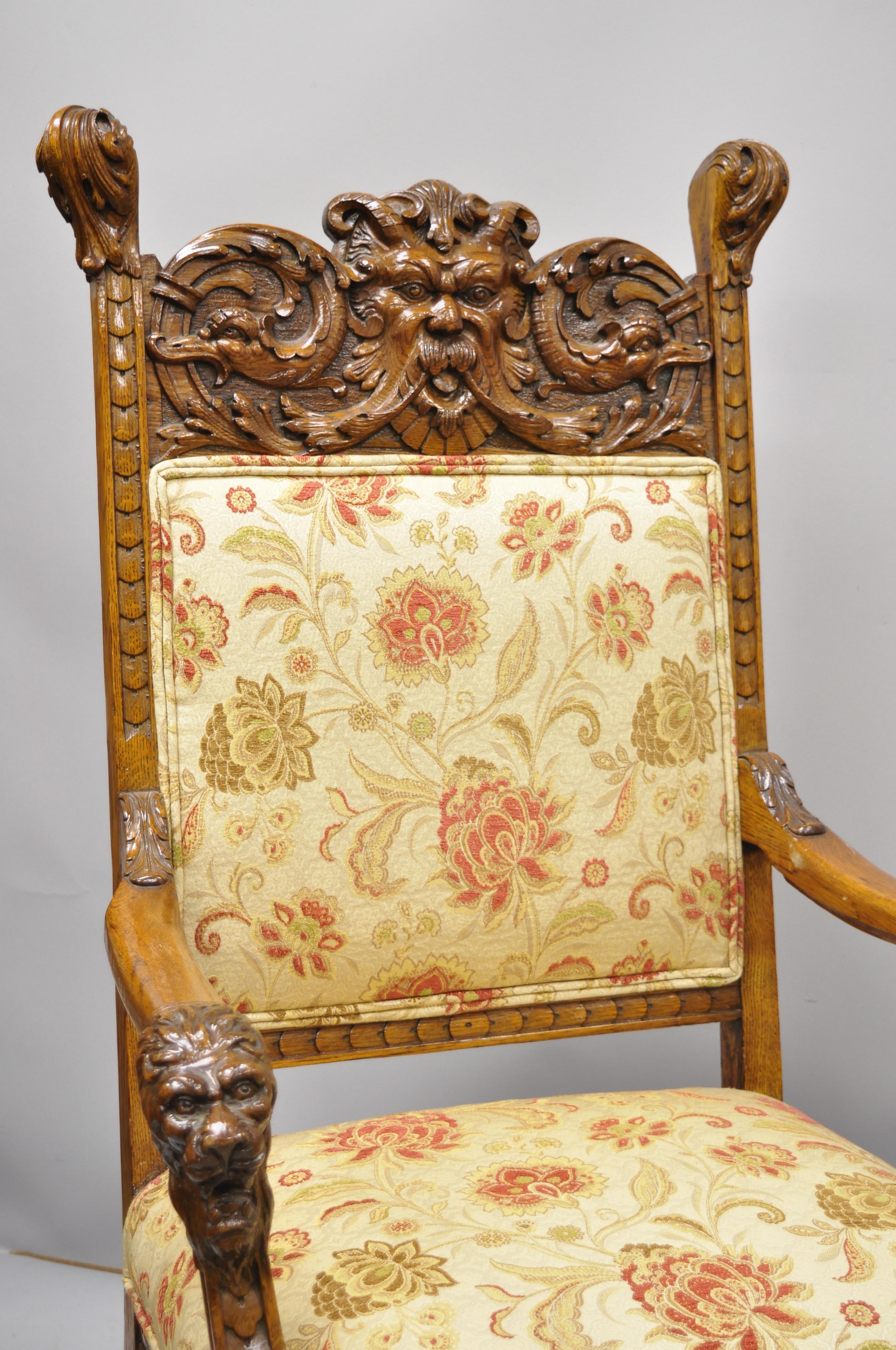 antique chair with lion head arms