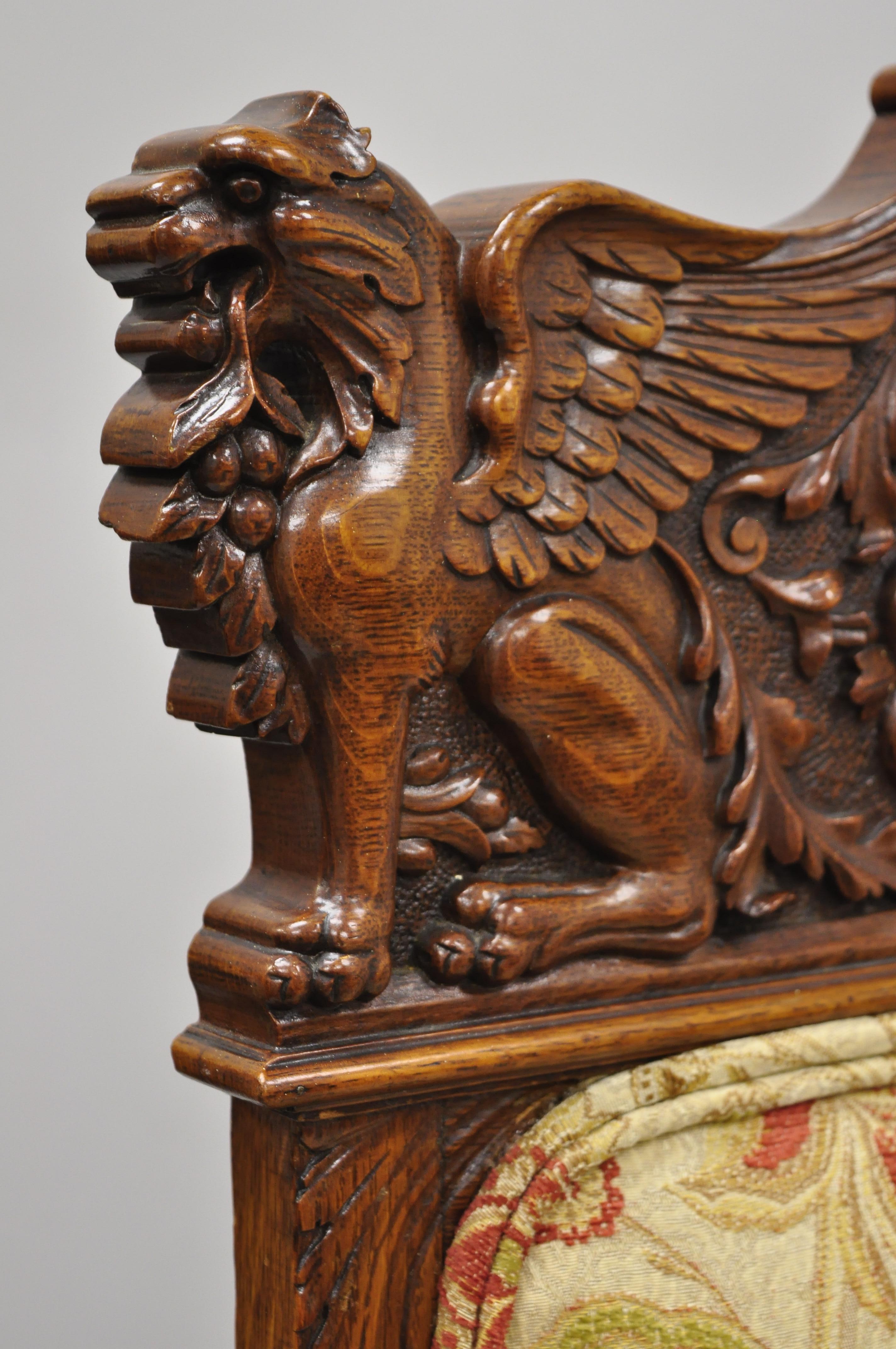 American Pair of Carved Oak Winged Griffin Paw Foot Dining Chairs Attributed RJ Horner For Sale