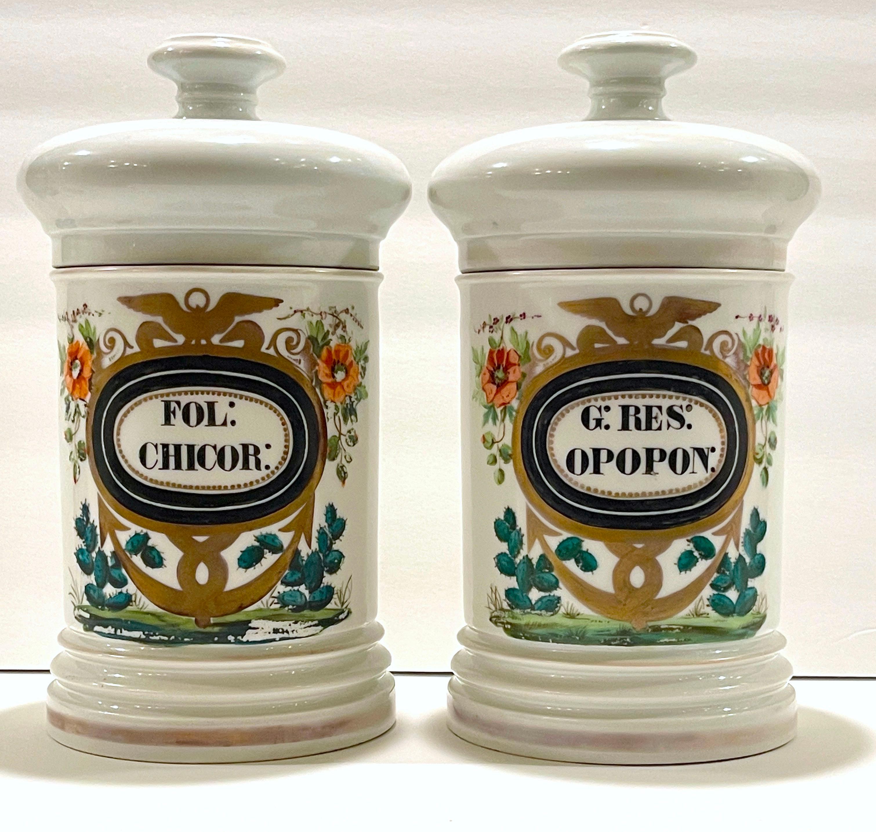 Pair 19th C. French Porcelain Cactus Motif Apothecary Jars by E.Renault Paris 
France, Mid to Late 19th century, probably made for the Mexican Market

Each one of substantial size, finely decorated within a stylized Caduceus vignette, labeled