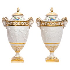 Pair 19th C. French Sevres Biscuit Porcelain Lidded Vases w/ Rams Head and Putti