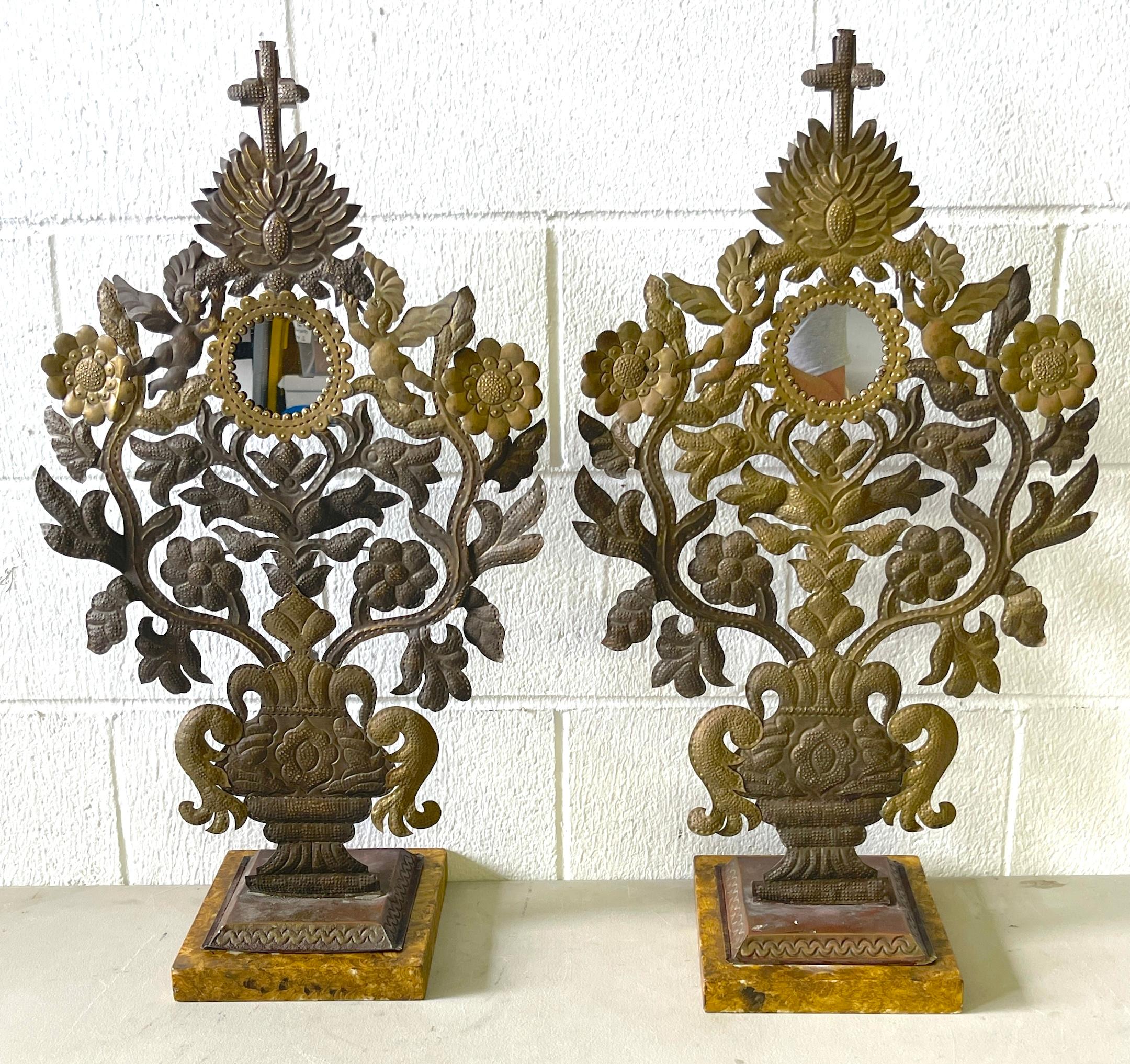 Pair of 19th-century Spanish Colonial Baroque Silvered and Gilt Tole Mirrored Reliquaries 
A magnificent pair of 19th-century Spanish Colonial Baroque silvered and gilt-tole mirrored reliquaries. Each reliquary stands 28.75 inches high and 16 inches