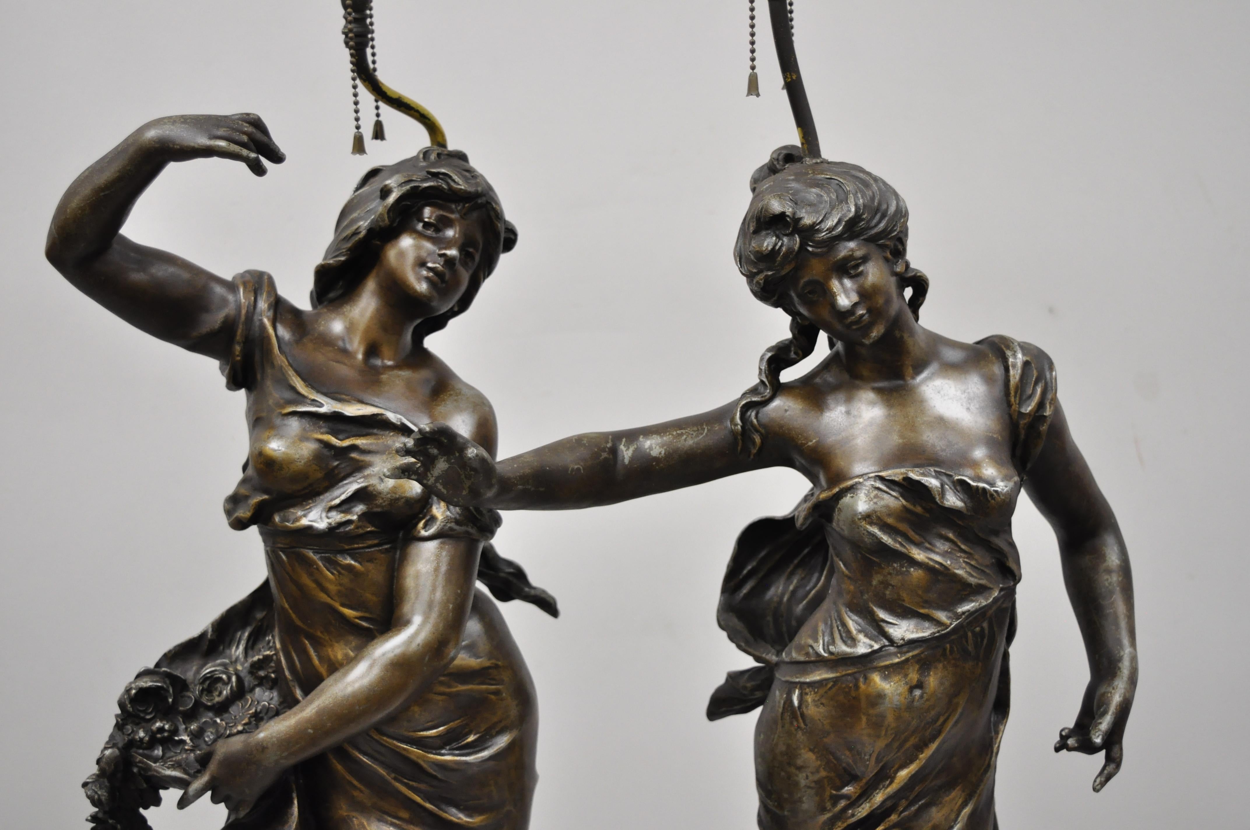 Pair of 19th century antique Spelter metal large figural French Victorian woman table lamps. Listing includes large impressive forms, double light sockets, marked 