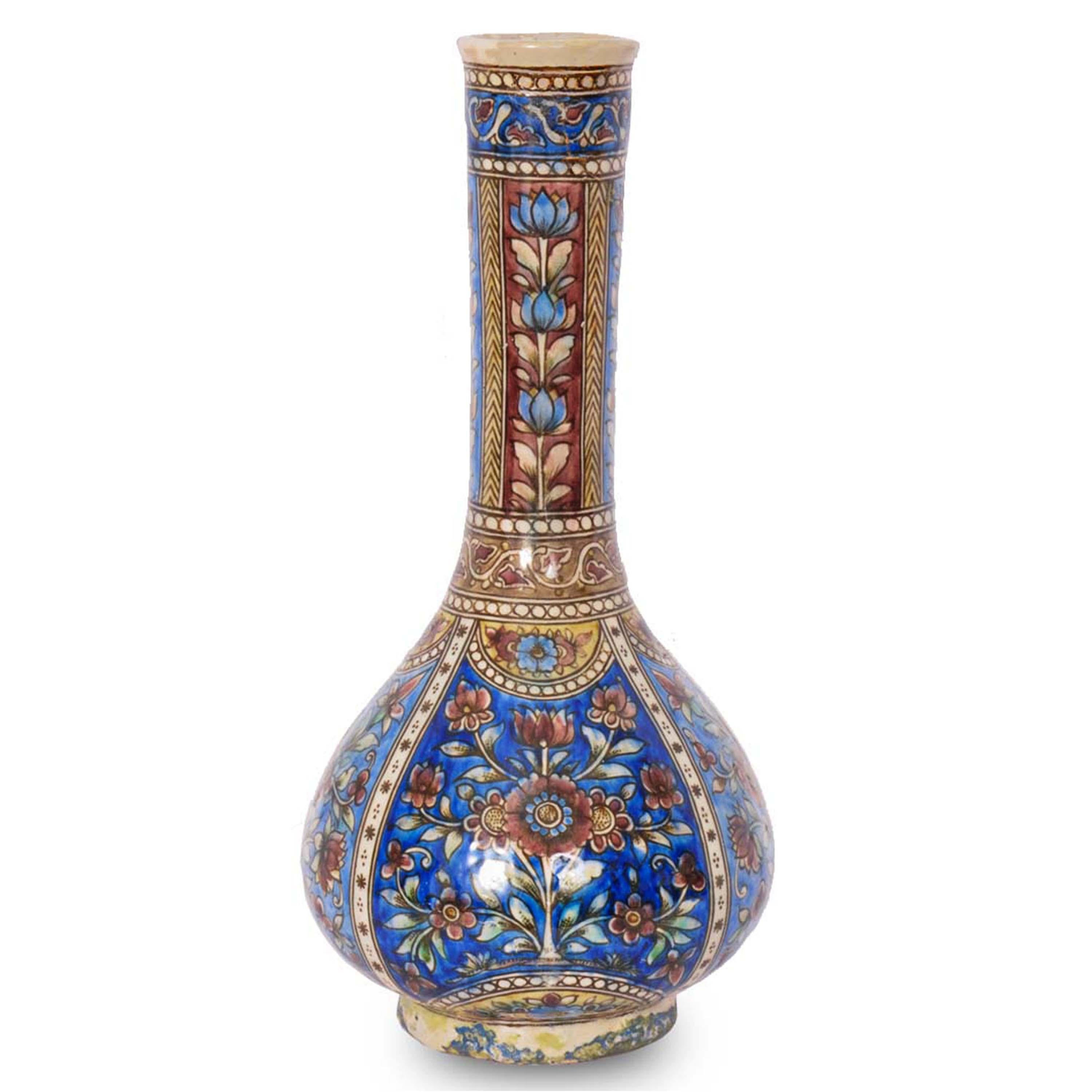 A good pair of antique early 19th century Ottoman Islamic Iznik/Kutahya pottery bottle vases, Turkey, circa 1820.
The vases of bottle form with a flared mouth and tapering neck, having globular shaped bases and raised on a circular flared foot. Each