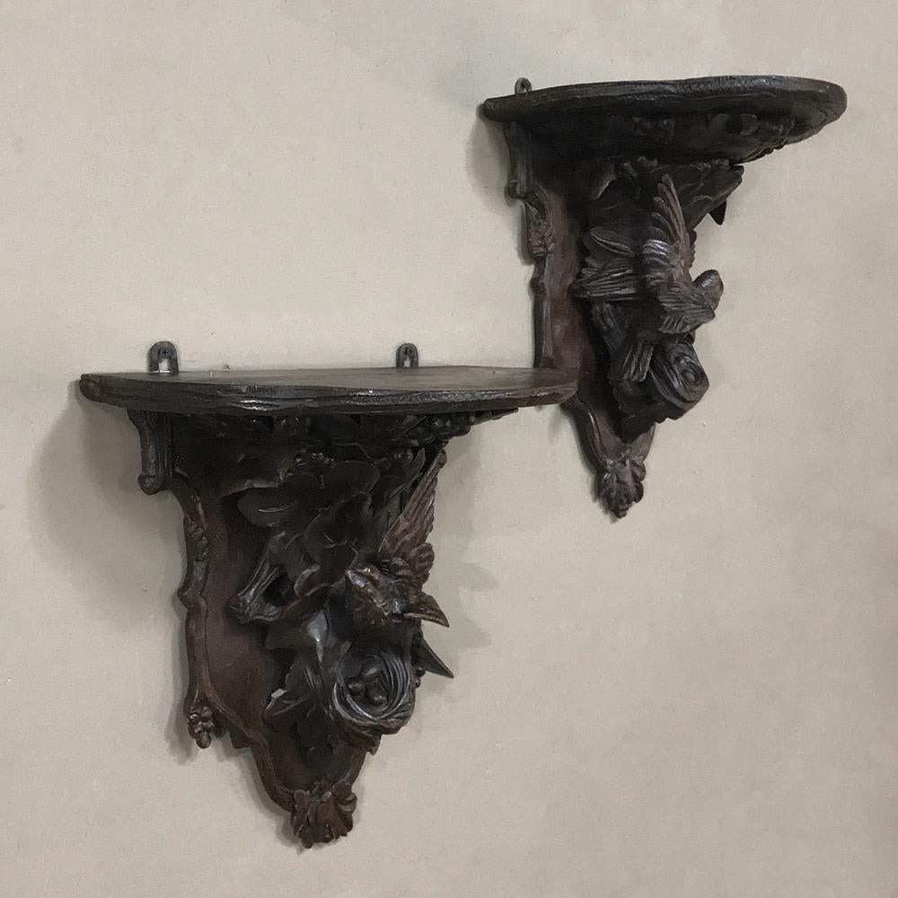 Hand-Carved Pair of 19th Century Black Forest Wall Sconces