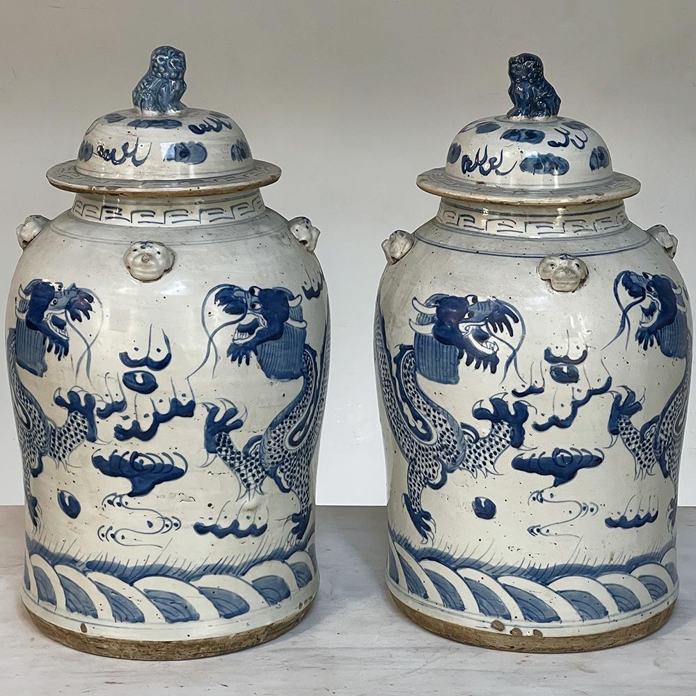Pair 19th century blue & white Chinese Lidded Urns will make a delightful addition to your decorating scheme! handcrafted from local clays, each features a timeless design that has proven to be very stable over the centuries, with a wide base and