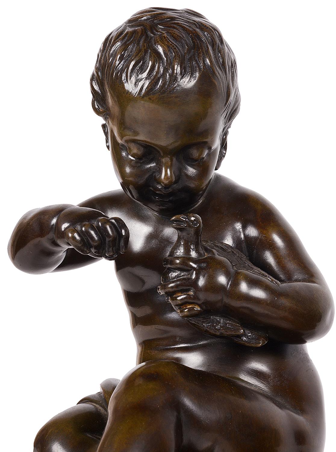 Pair 19th Century Bronze Putti Holding a Dove and Cage In Good Condition For Sale In Brighton, Sussex
