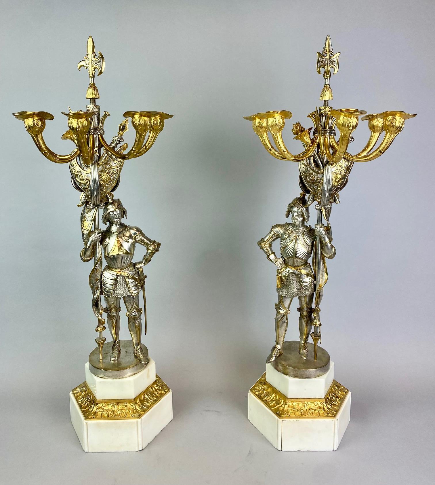 Dorato Pair 19th century  candelabra styled in the form of medieval knights in vendita