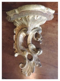 Coppia di mensole da parete in legno dorato intagliato del XIX secolo in stile Chippendale
