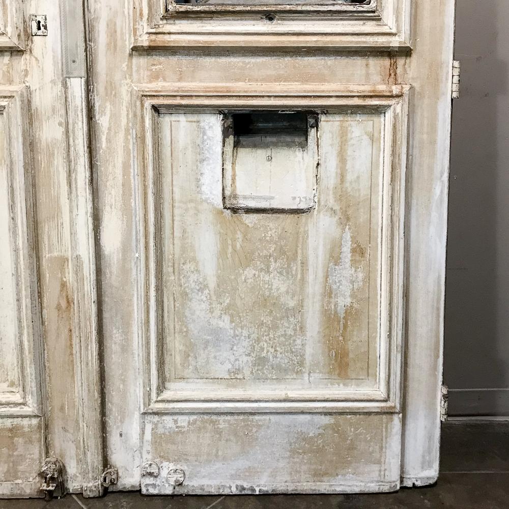 Pair of 19th Century Carved and Stripped Oak Doors with Wrought Iron 5