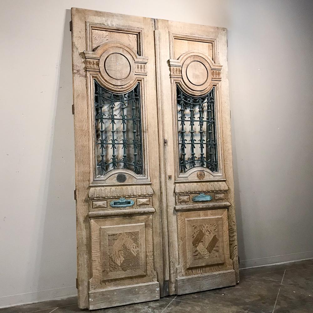 French Pair of 19th Century Carved and Stripped Oak Doors with Wrought Iron