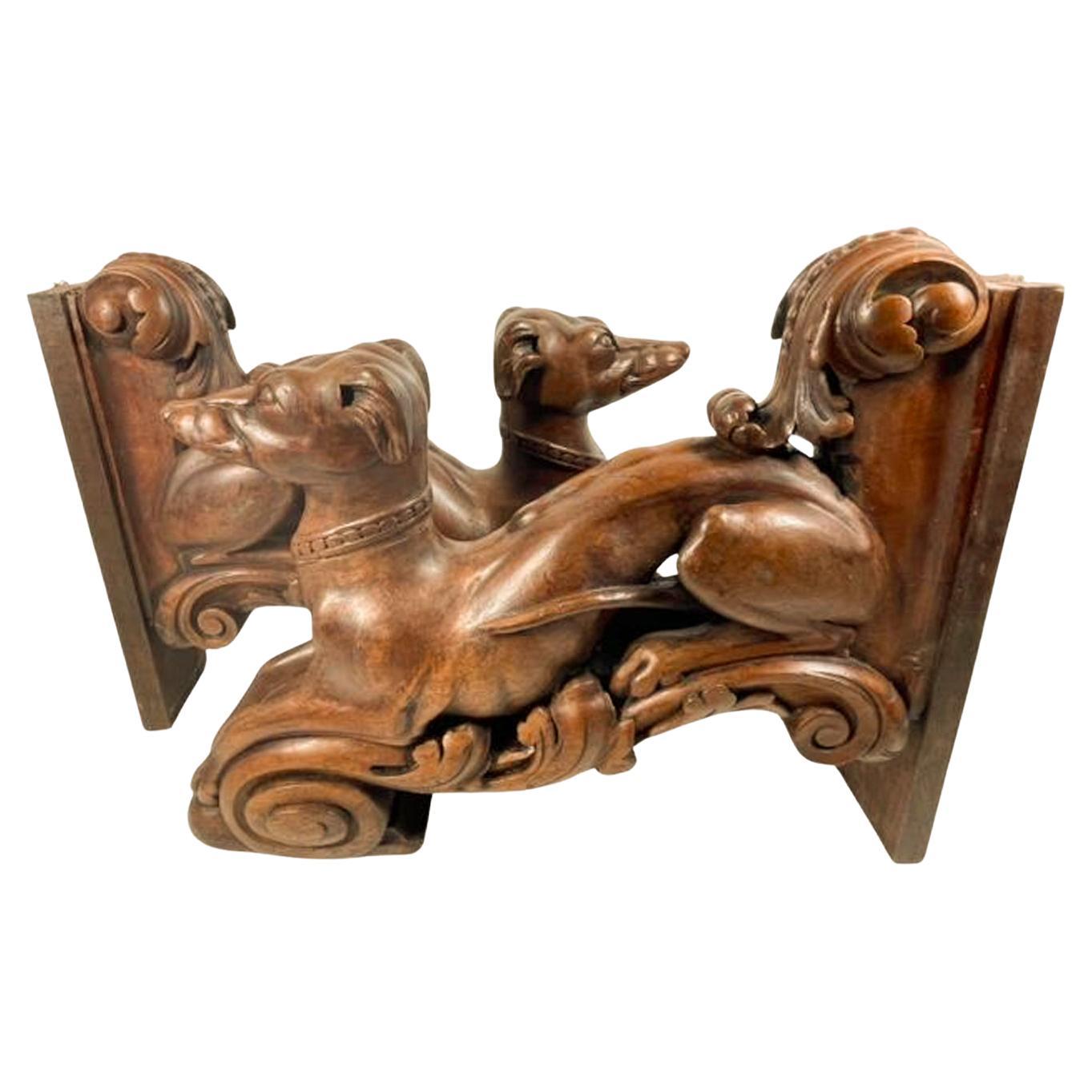 Pair 19th Century Carved Wood Figures of Recumbent Whippets on Foliate Brackets For Sale