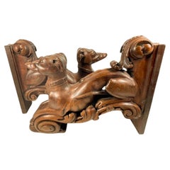 Antique Pair 19th Century Carved Wood Figures of Recumbent Whippets on Foliate Brackets