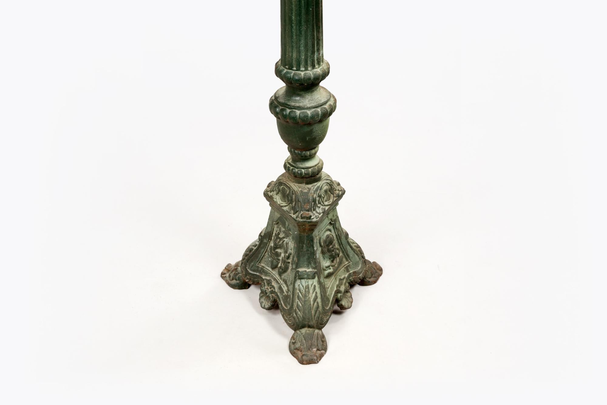 antique cast iron candle holders