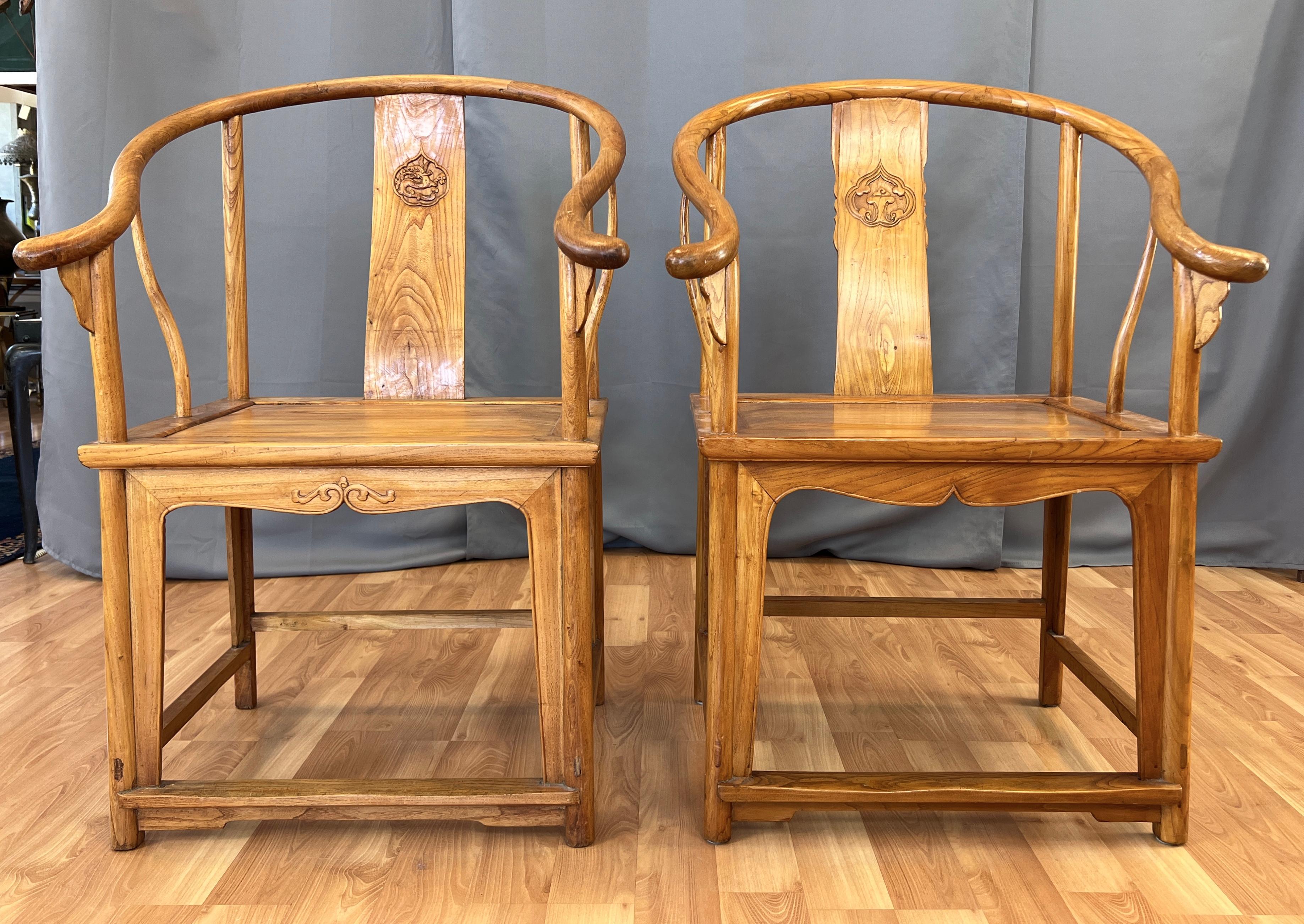 Chinese Export Pair 19th Century Chinese Elm Wood Horseshoe Chairs Qing Dynasty For Sale