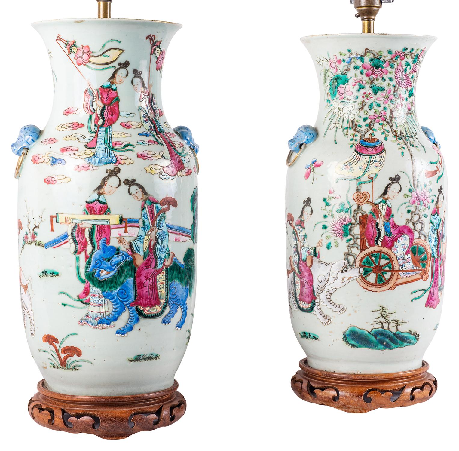 A very decorative pair of Chinese 19th century Famille rose vases / lamps, each with wonderful bold colours to the classical oriental scenes.