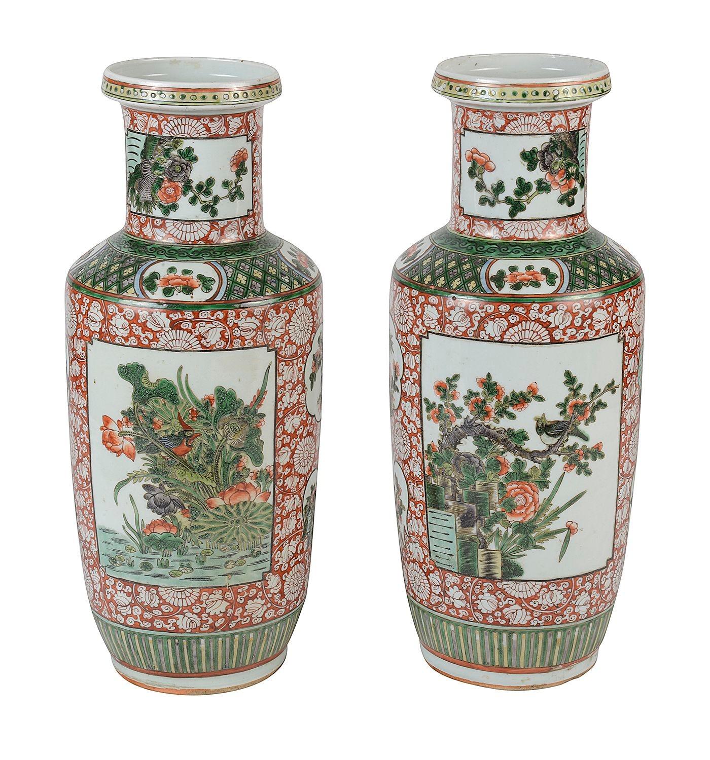 A good quality pair of late 19th Century Chinese Famille Verte porcelain vases / lamps. Each with a bold green and orange ground. Classical motif and scrolling foliate decoration.Inset hand painted panels depicting birds perched in blossom trees.
We