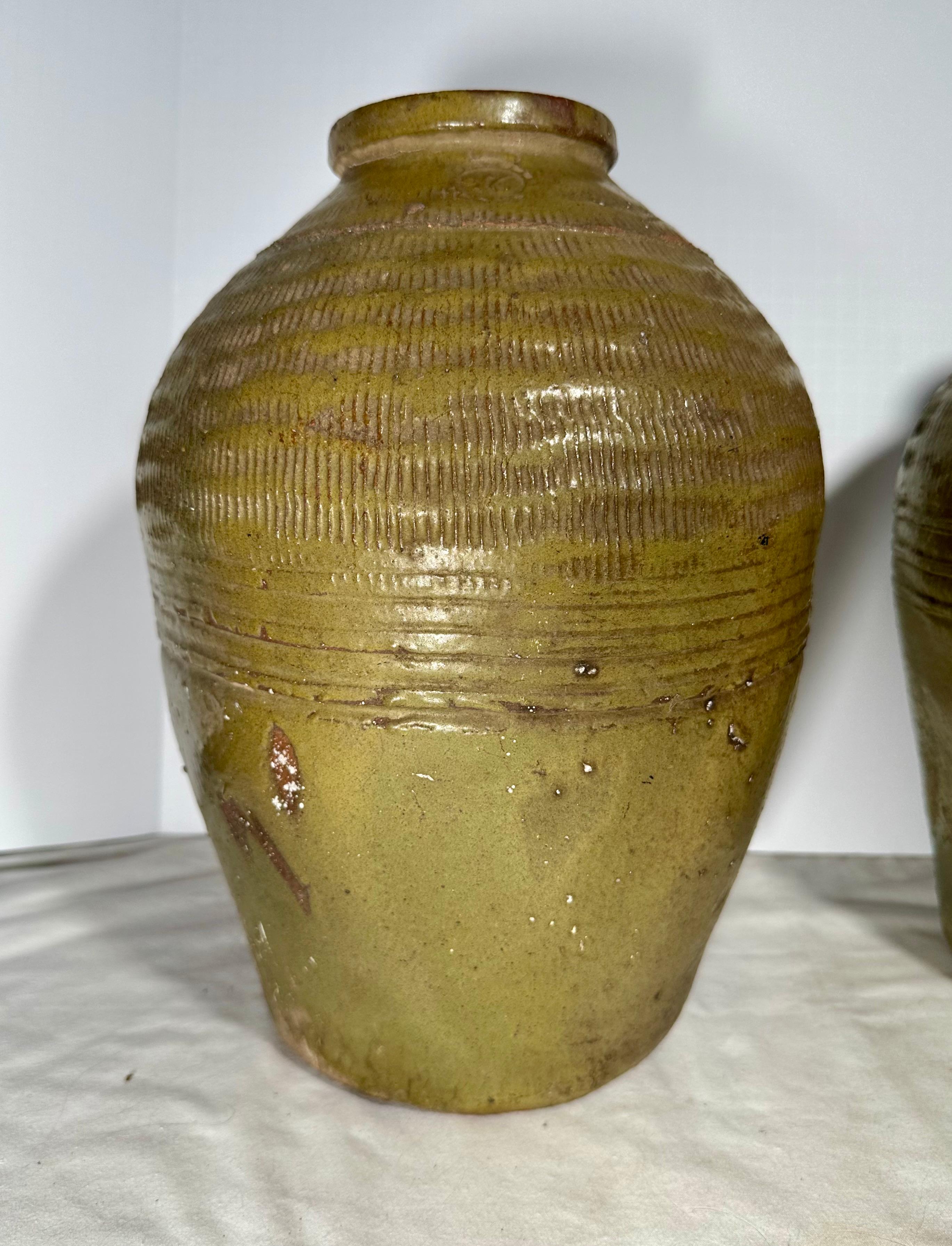 Pair 19th Century Chinese Glazed Pickling Jars. For Sale 1